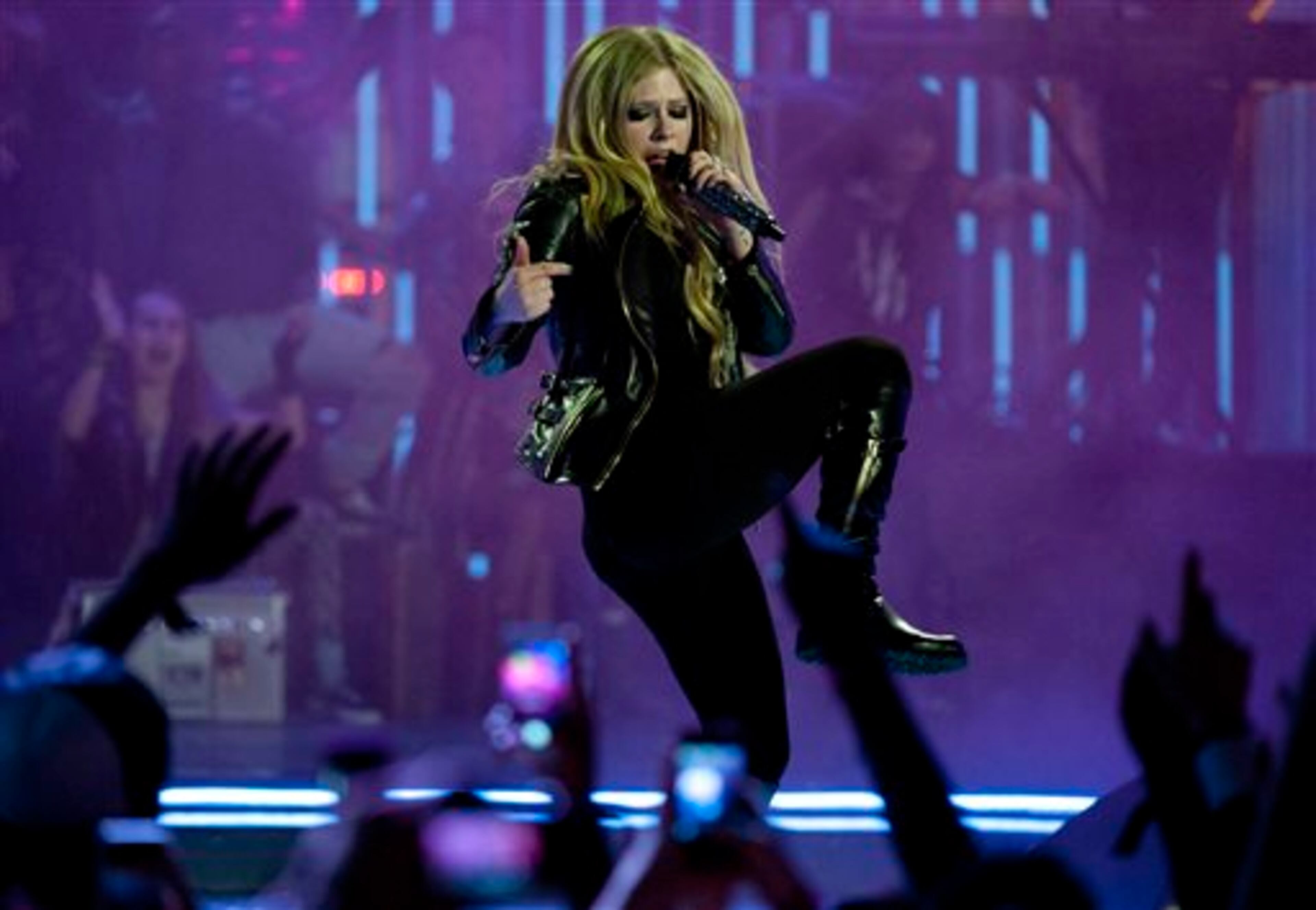 Avril Lavigne performs during the 2013 Much Music Video Awards in Toronto on Sunday June 16, 2013. (AP Photo/The Canadian Press, Aaron Vincent Elkaim)