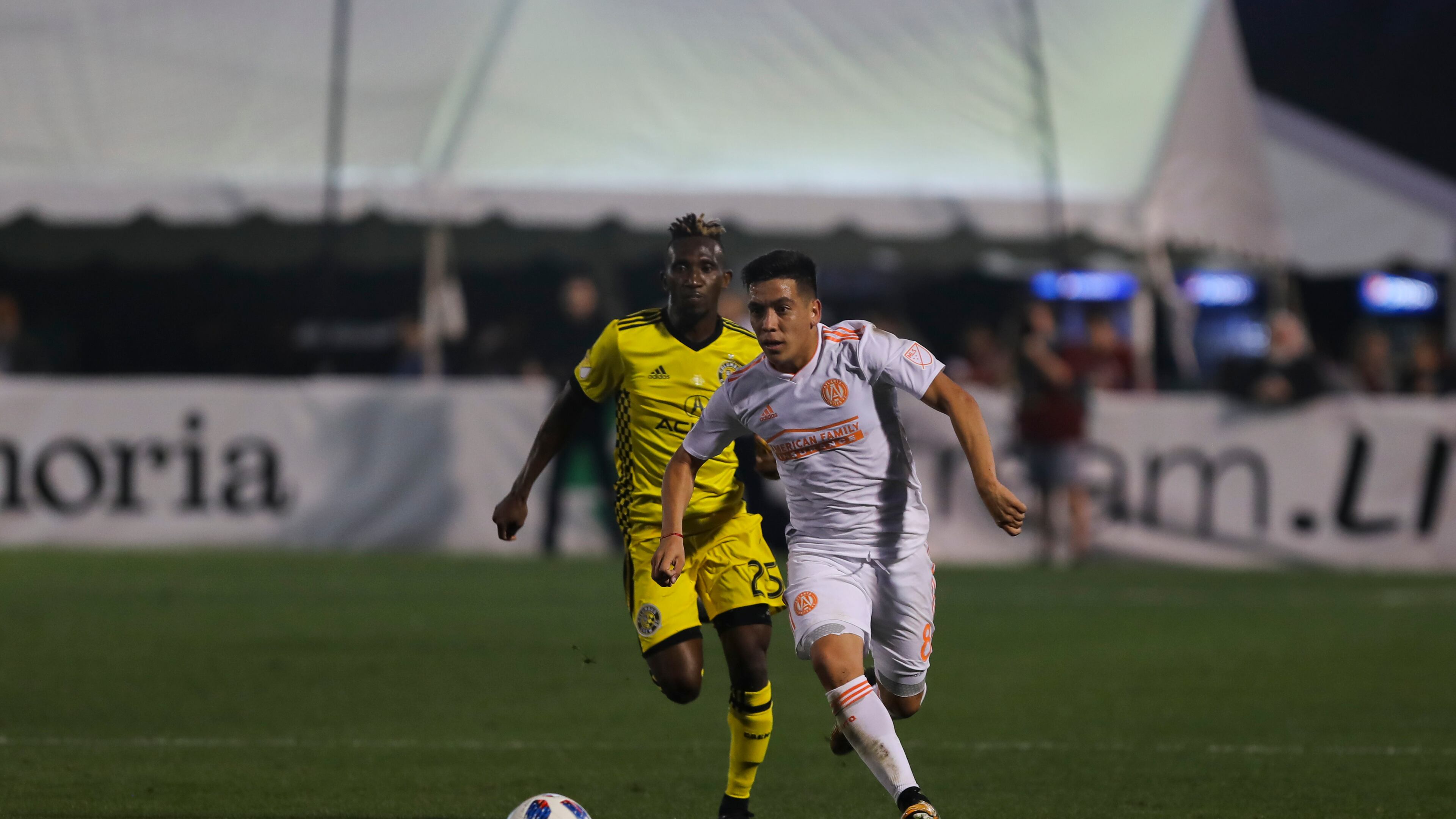 Atlanta United's Ezequiel Barco dribbles past a Columbus player in Saturday's preseason match in Charleston, S.C. (Eric Rossitch / Atlanta United)