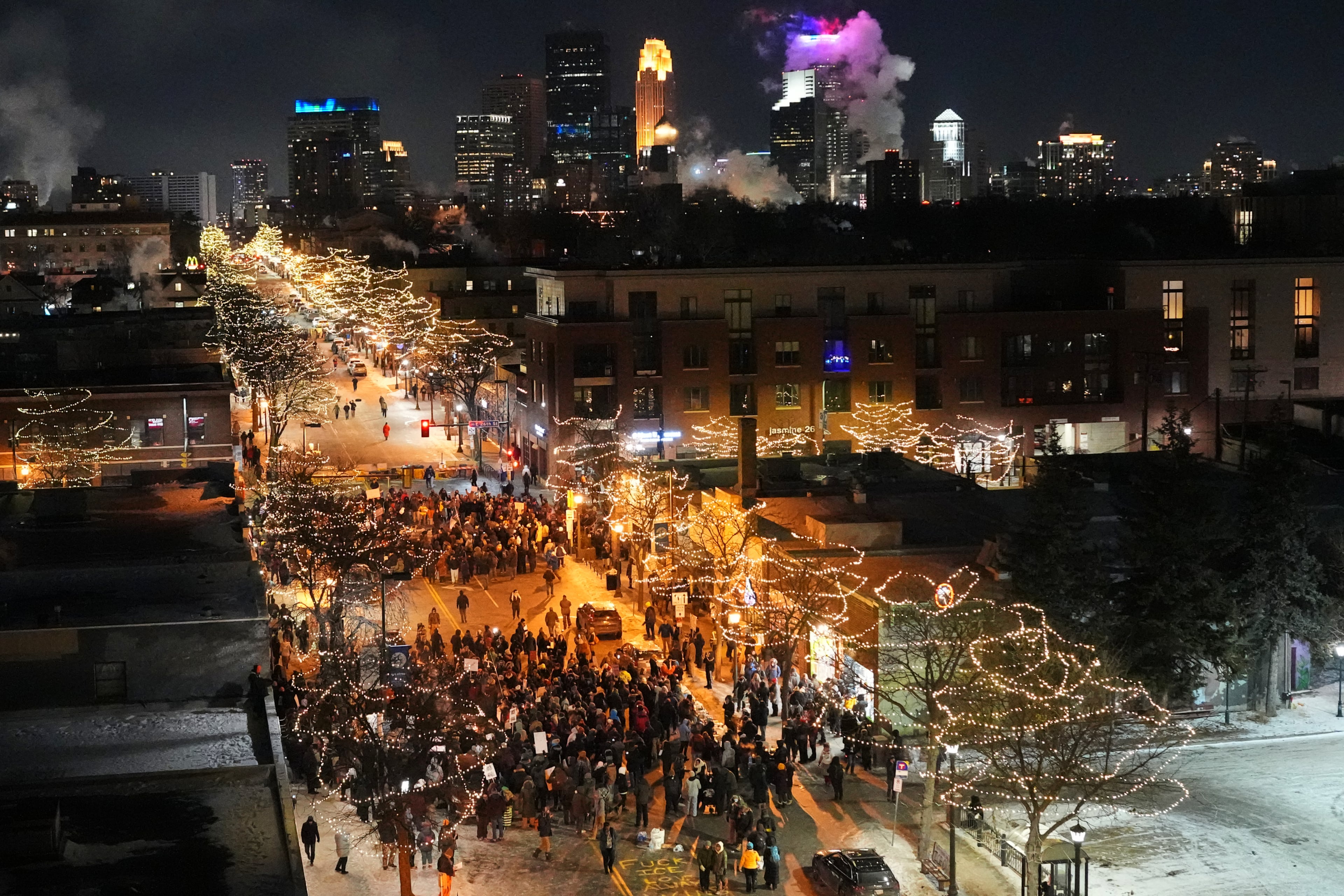 People gather during a vigil for Alex Pretti, who was fatally shot by a U.S. Border Patrol officer earlier in the day on Saturday, Jan. 24, 2026, in Minneapolis. (Adam Gray/AP)