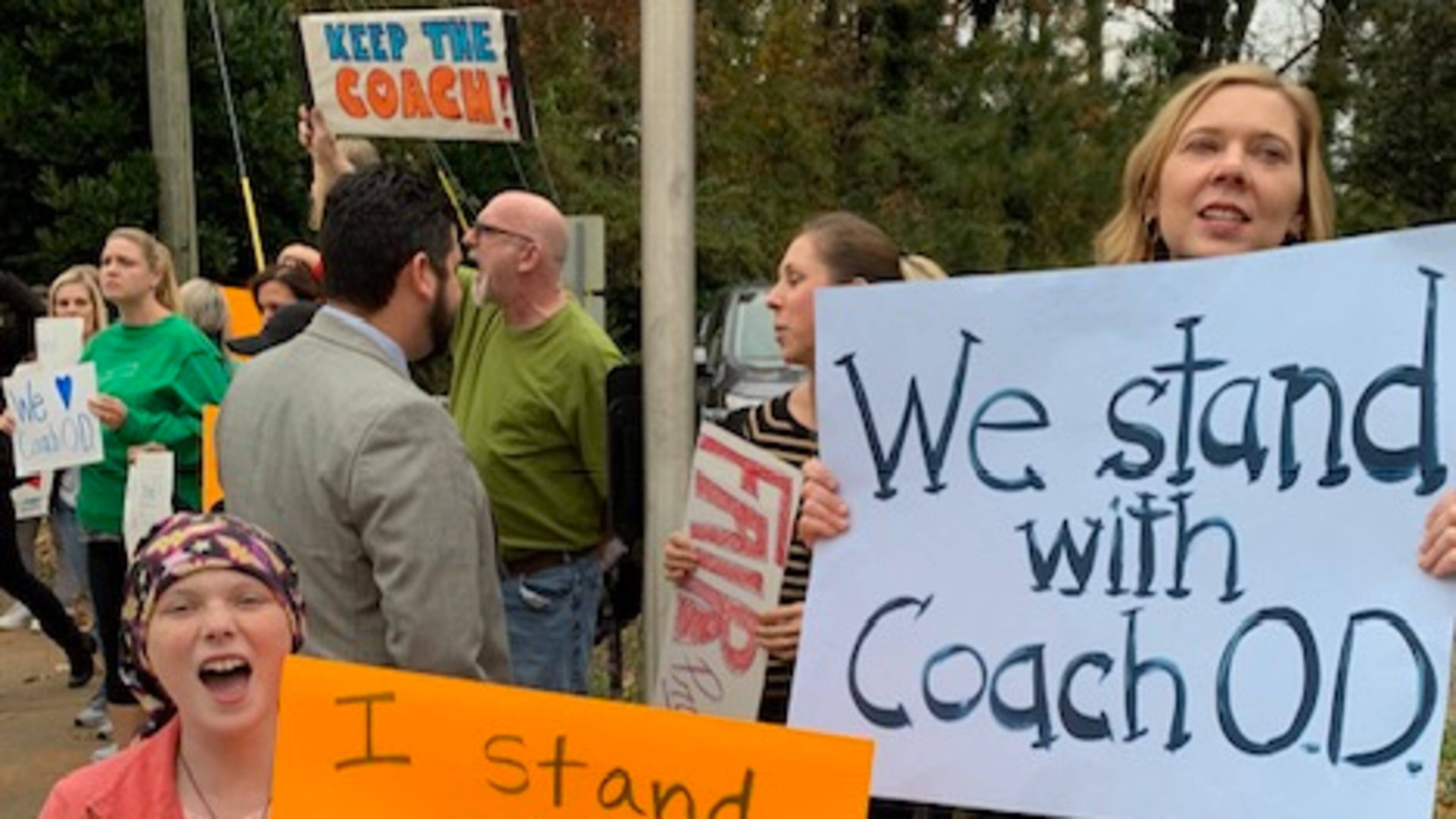 Henderson Mill Elementary parents and students have rallied for beloved PE coach James O'Donnell, suspended in November after a parent complained about how he disciplined her son.