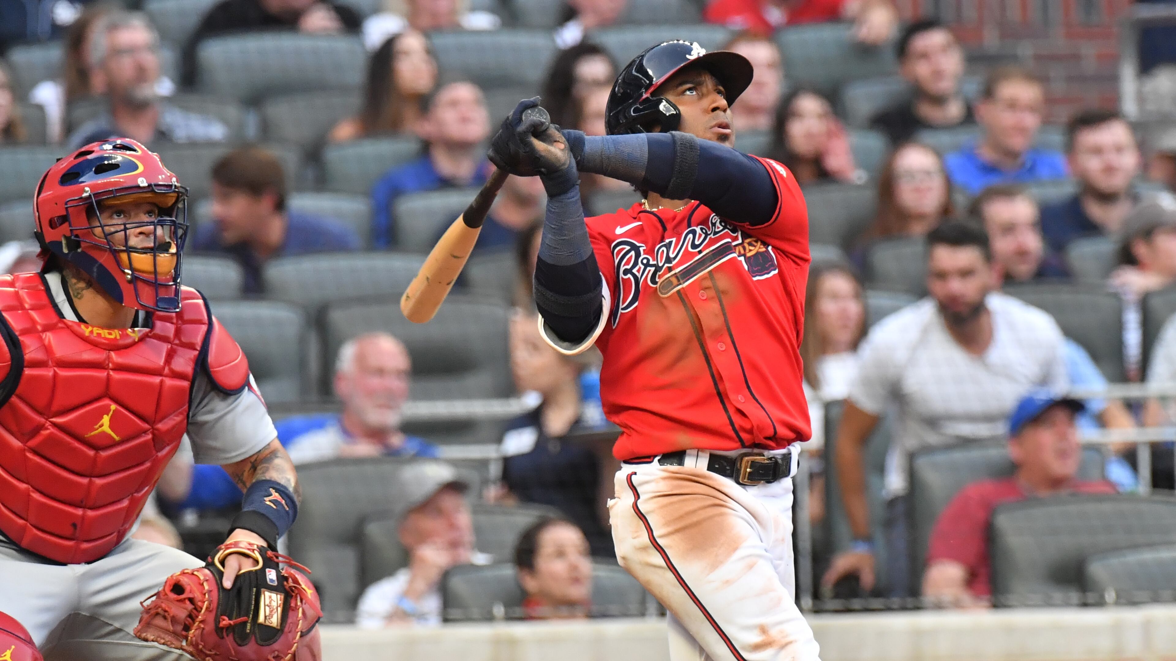 Braves second baseman Ozzie Albies (1) hits a home run in the second inning against the St. Louis Cardinals Friday, June 18, 2021, at Truist Park in Atlanta. (Hyosub Shin / Hyosub.Shin@ajc.com)