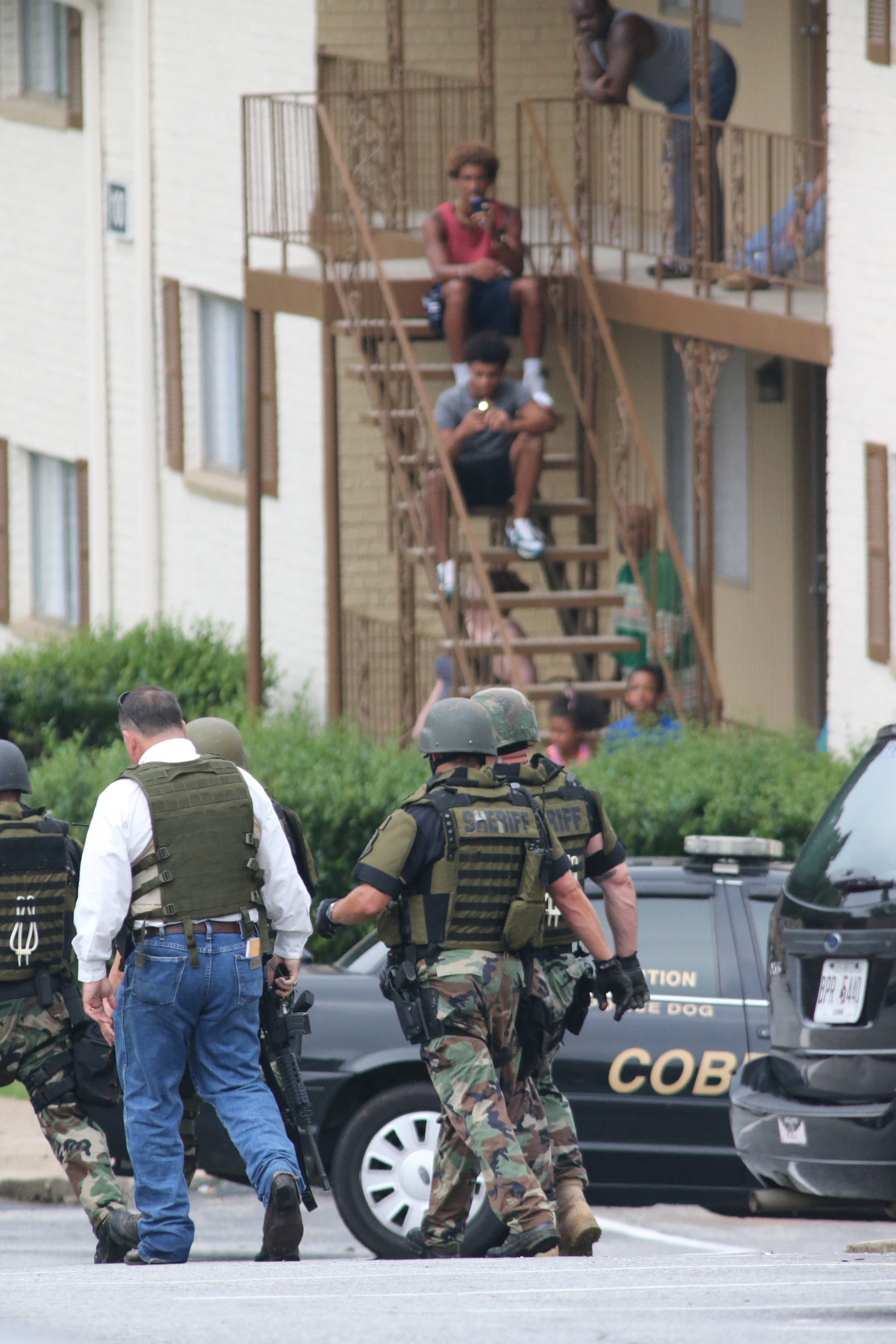 A Cobb County police officer was shot while on a routine patrol shortly after 1 a.m. He was shot during an encounter with a man walking through Concord Chase Apartments on Hurt Road near Smyrna. Friday morning, dozens of police officers scoured the area for the suspect.
