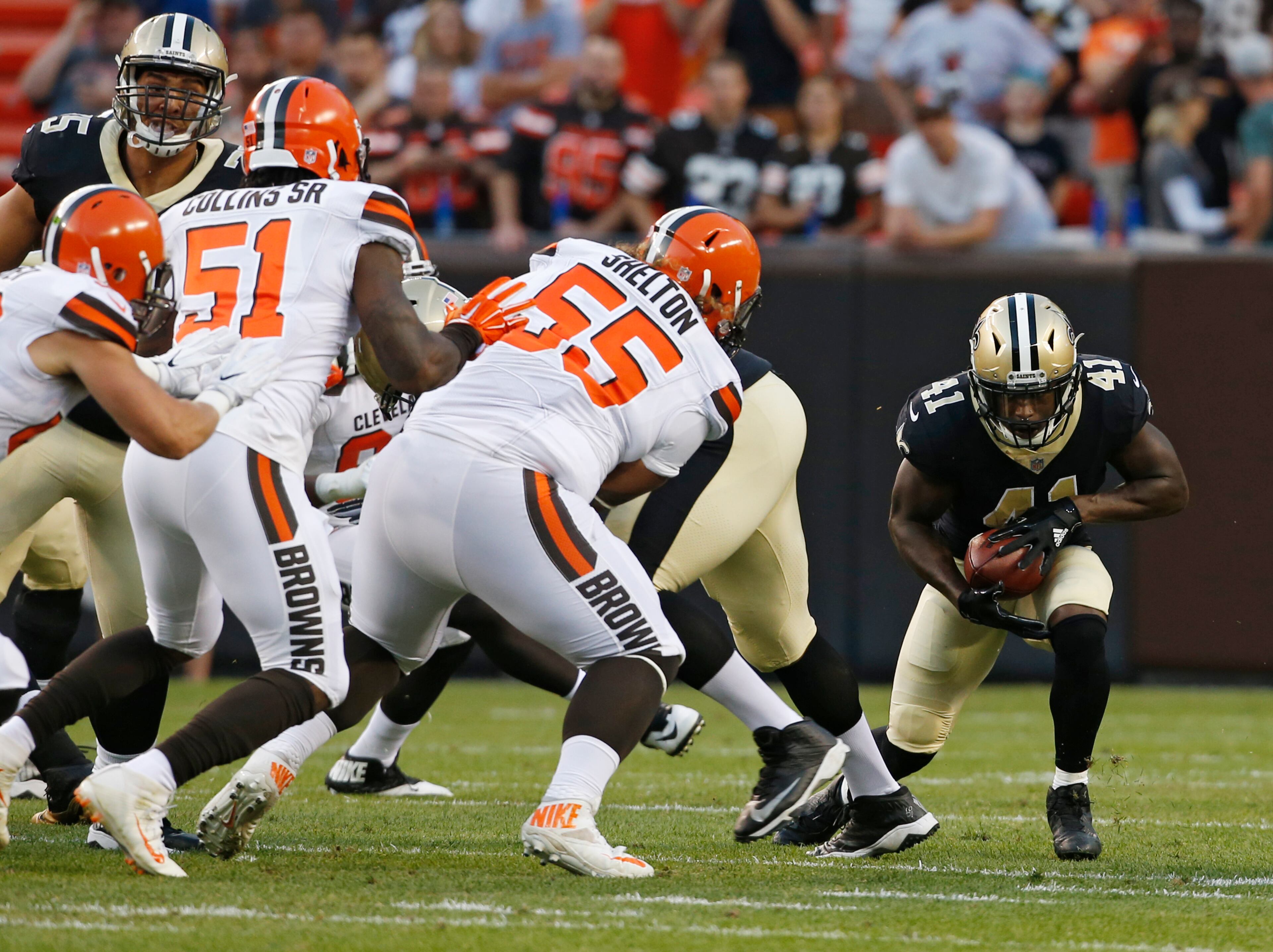 New Orleans Saints running back Alvin Kamara (41) runs the ball during the first half of the team's NFL preseason football game against the Cleveland Browns, Thursday, Aug. 10, 2017, in Cleveland. (AP Photo/Ron Schwane)
