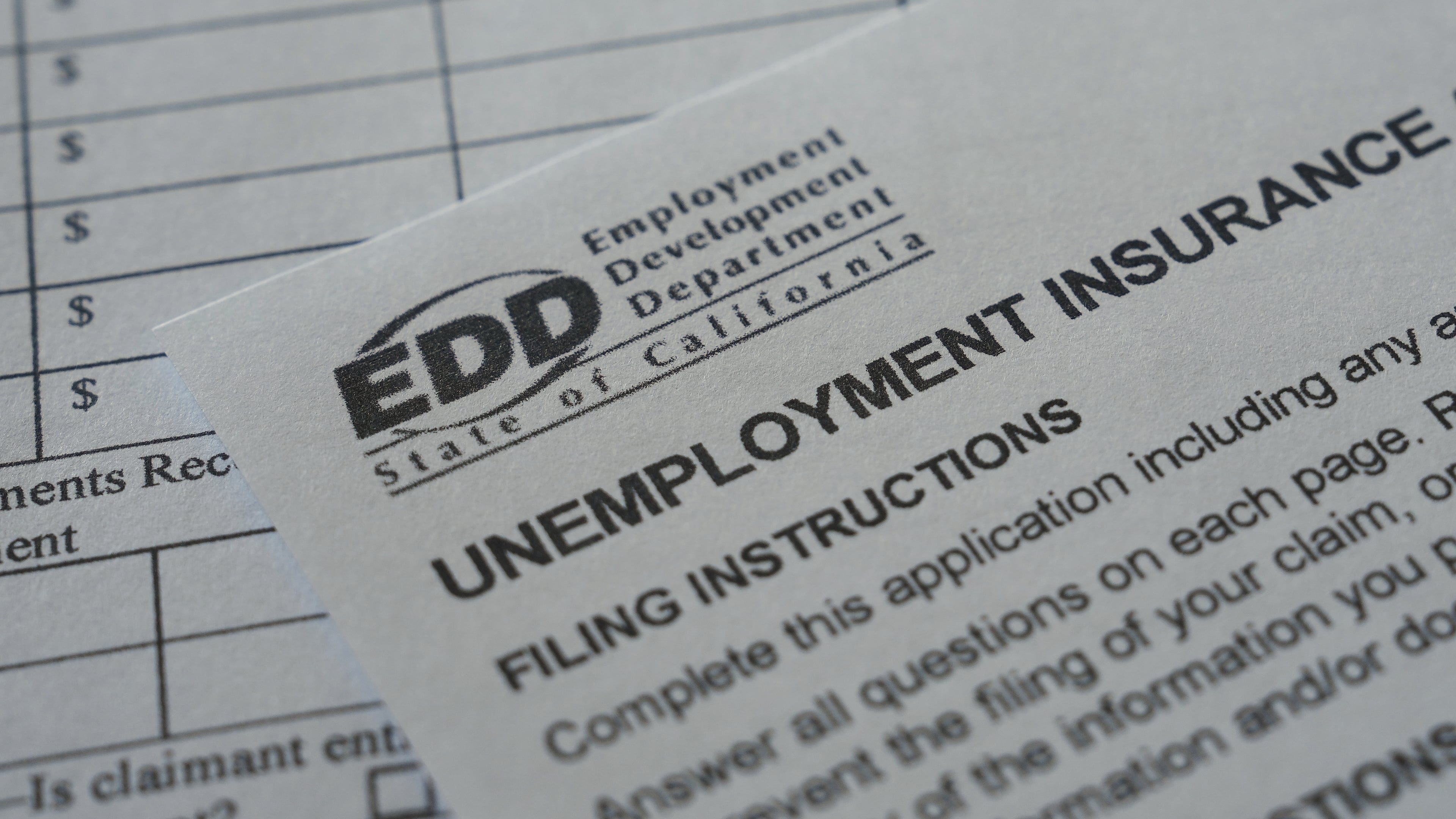 A California unemployment benefits form is shown Wednesday, July 8, 2026, in Detroit. (AP Photo/Paul Sancya)