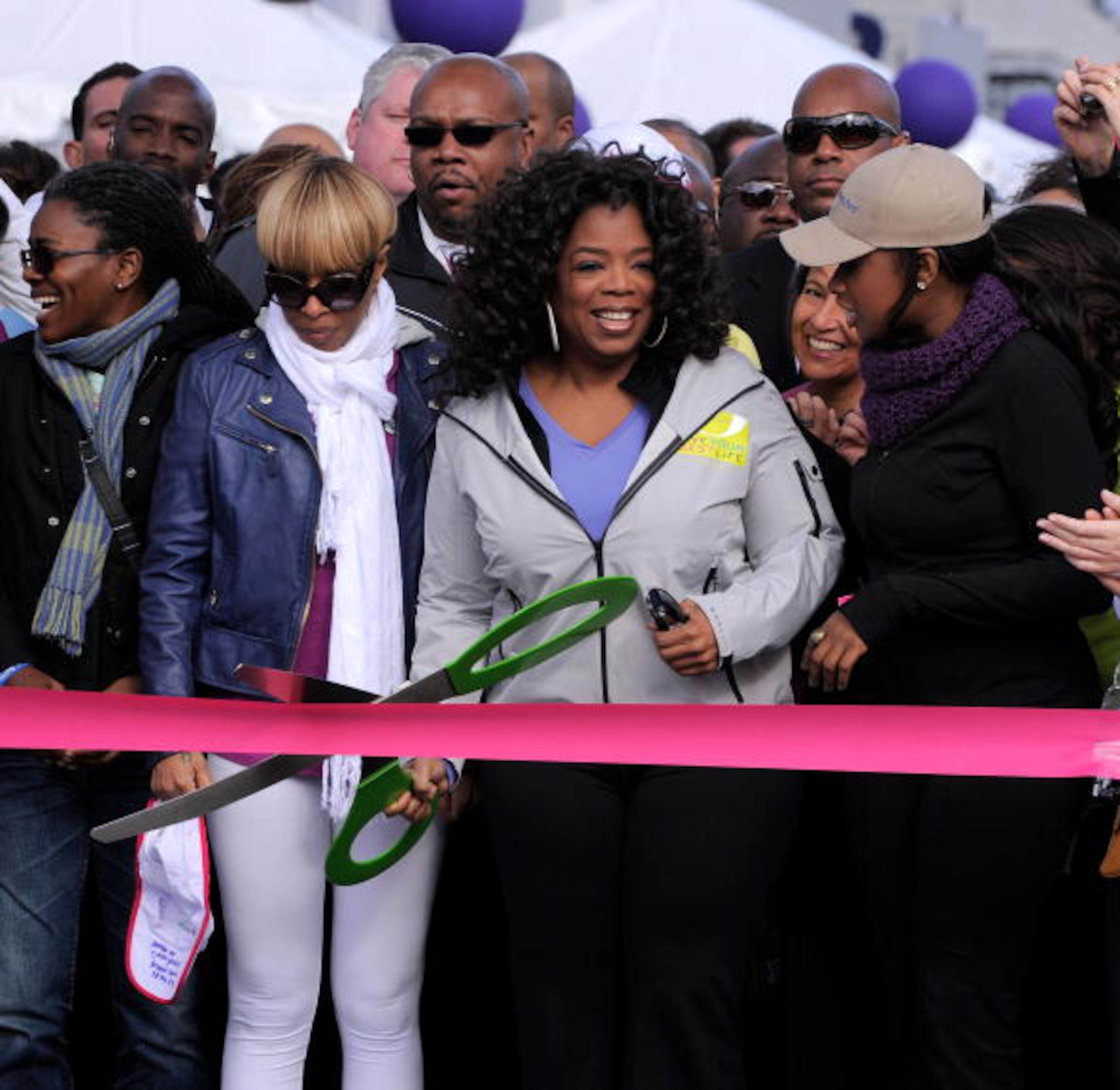 NEW YORK - MAY 09: Singer Mary J. Blige, media personality Oprah Winfrey and singer Jennifer Hudson prepare to cut the ribbon to signal the start of the "Live Your Best Life Walk" to celebrate O, The Oprah Magazine's 10th Anniversary at Intrepid Welcome Center on May 9, 2010 in New York City. (Photo by Jemal Countess/Getty Images)
