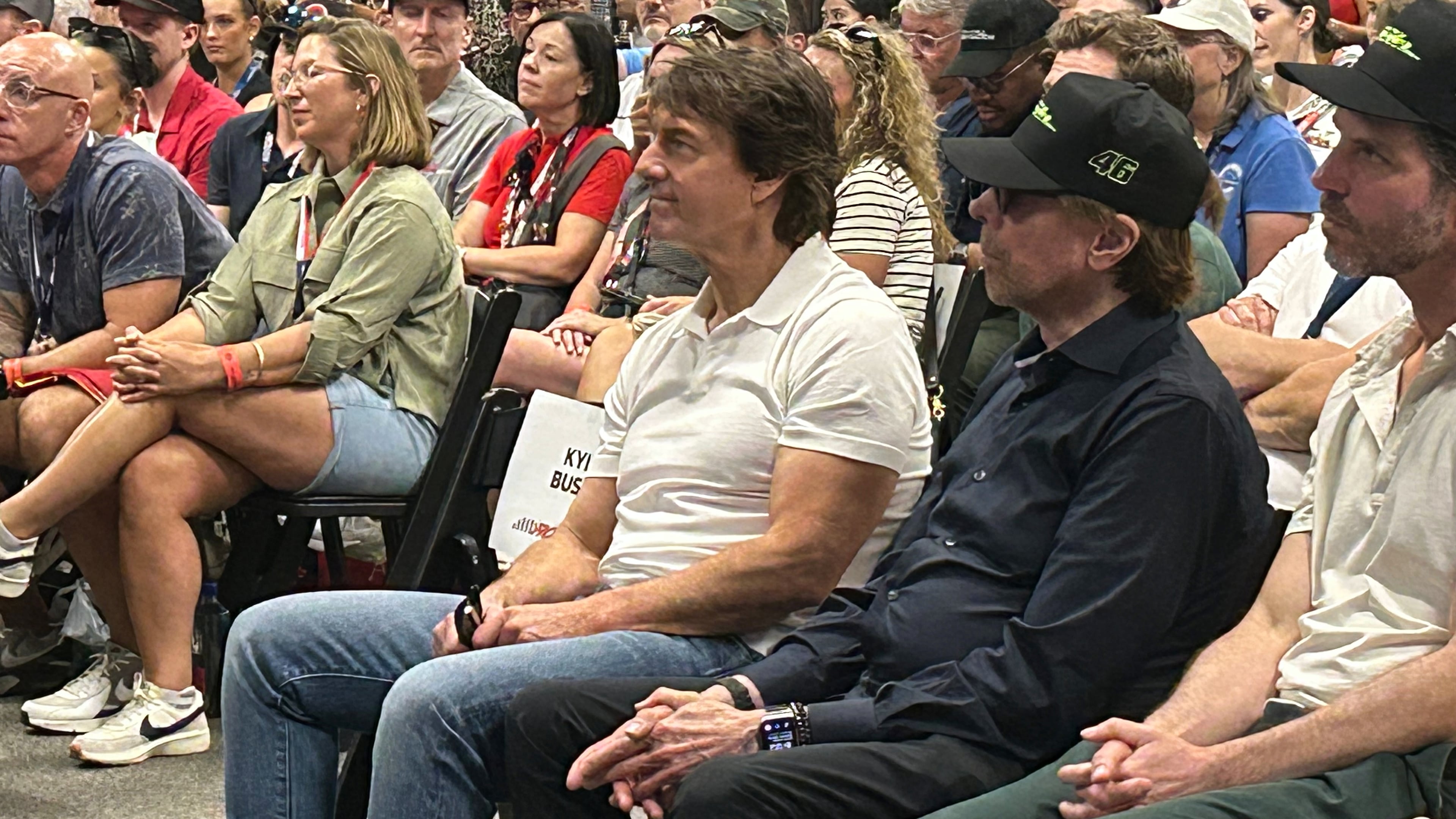 Actor Tom Cruise and movie producer Jerry Bruckheimer attend a drivers meeting before a NASCAR Cup Series auto race at Daytona International Speedway, Saturday, Aug. 29, 2026, in Daytona Beach, Fla. (AP Photo/Mark Long)