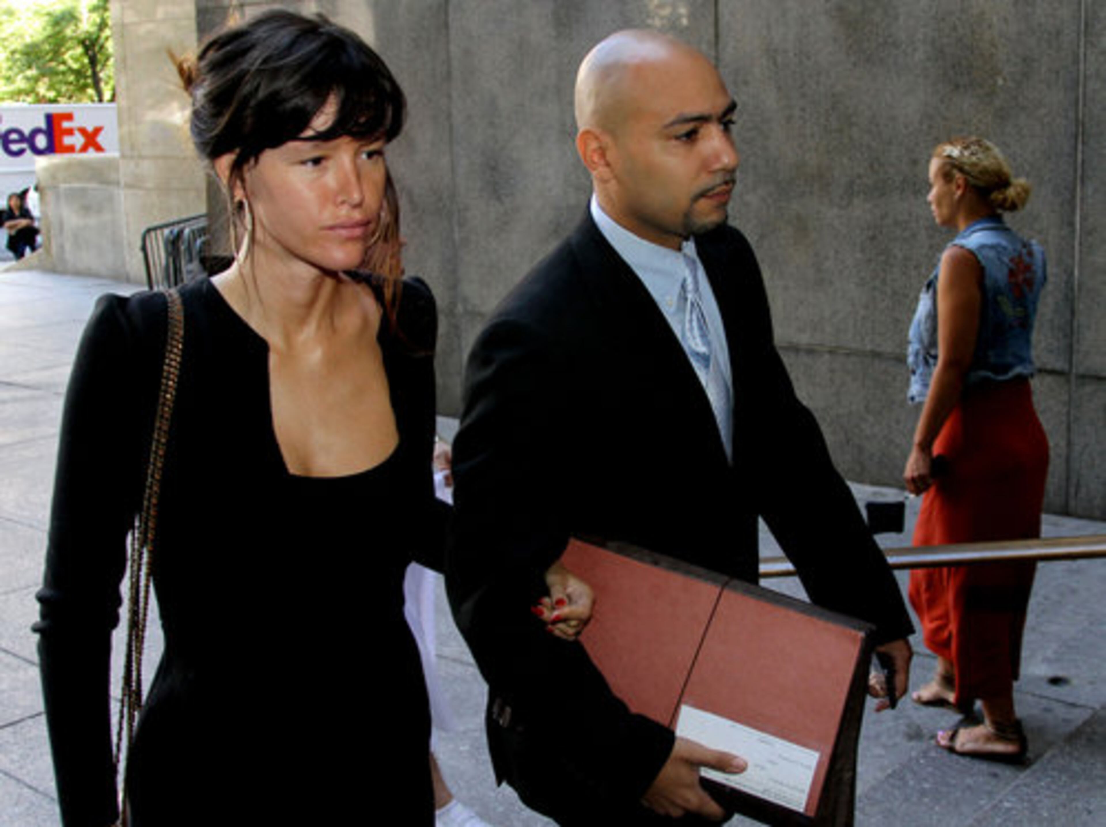 A SOBER PAZ: Actress Paz de la Huerta walks with her attorney Jamel Oeser-Sweat into the Manhattan Criminal Courts building, on Thursday, July 14, 2011 in New York. The "Boardwalk Empire" actress pleaded guilty Thursday to harassment in her March encounter with Samantha Swetra, who appeared on the MTV reality series "The City."