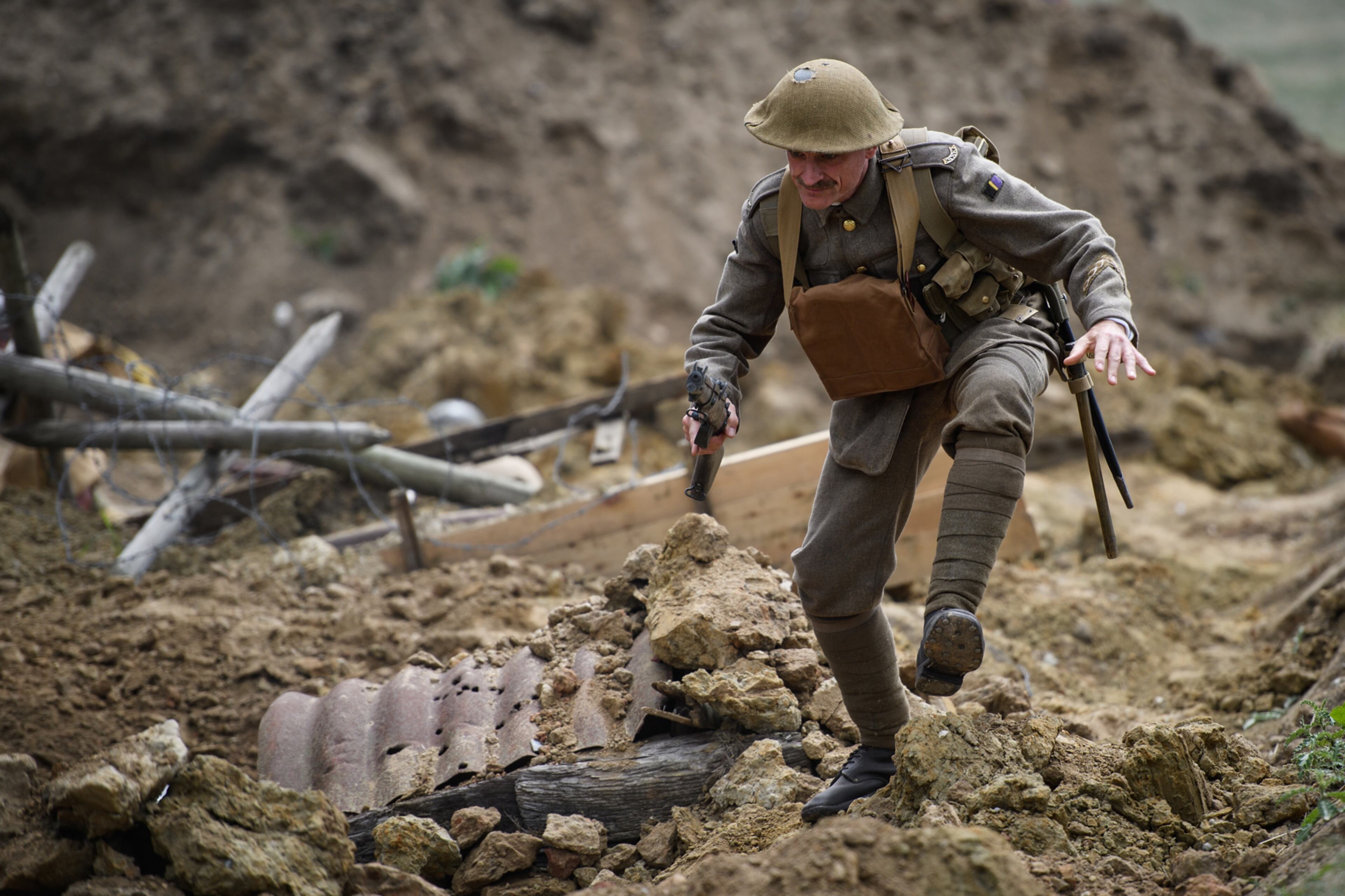 YPRES, BELGIUM - JULY 30: "Living History" actors recreate the "Passchendaeale Battlefield Experience" on July 30, 2017 in Ypres, in the Ypres Salient battlefields area of Belgium. Dignitaries and descendants of those who fought are gathering to mark the centenary of Passchendaele, the third battle of Ypres, on 30 and 31 July 2017. The campaign saw intense fighting over 3 months, 1 week and 3 days with historians currently agreeing that both sides suffered losses of around 260,000 casualties each. (Photo by Leon Neal/Getty Images) *** BESTPIX ***