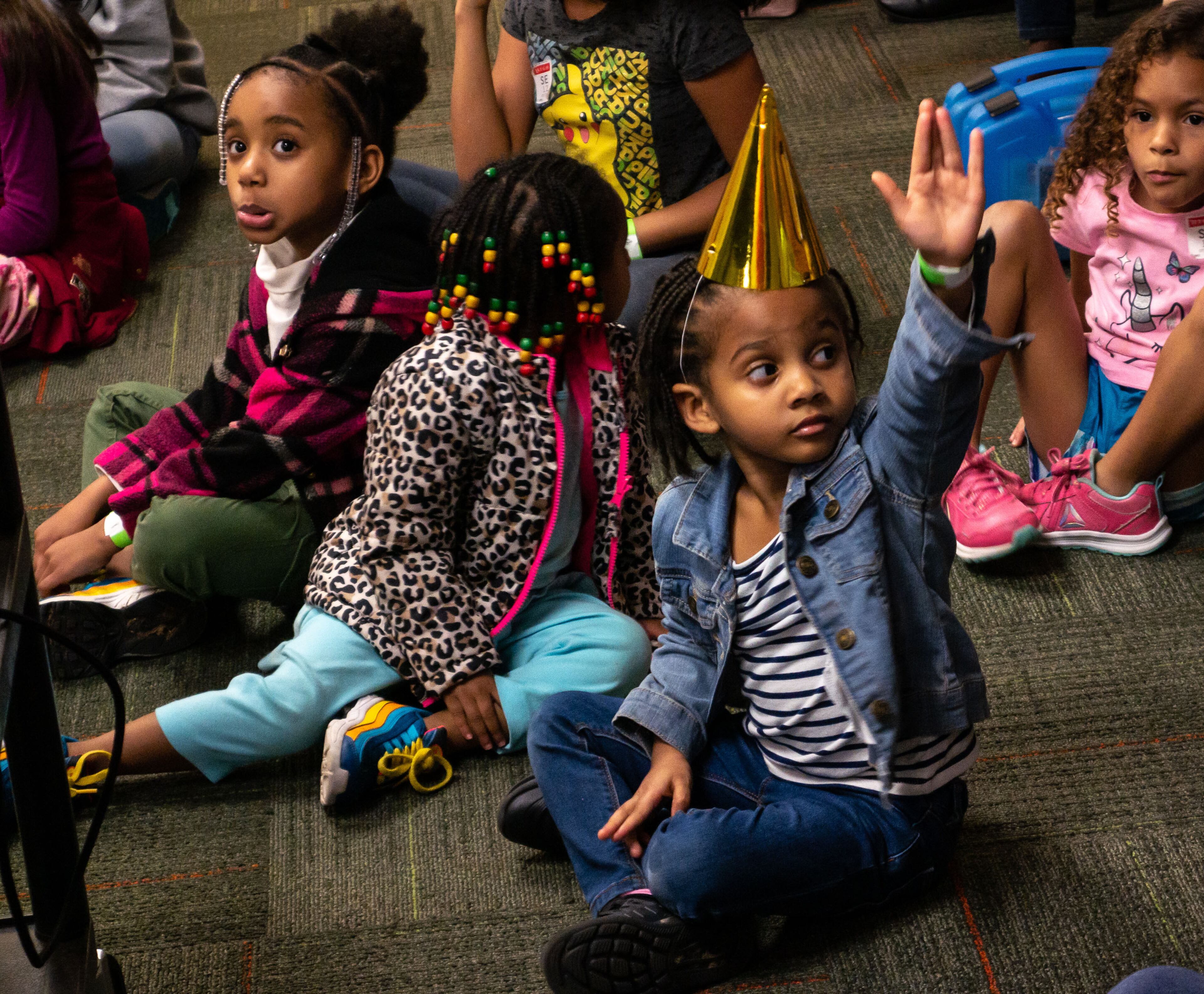 Amila Mayne tries to get called on to practice her casting slate during the on camera workshop during the Woodruff Family Fun Fest at the Woodruff Arts Center in Atlanta on Sunday, January 12, 2020. STEVE SCHAEFER / SPECIAL TO THE AJC