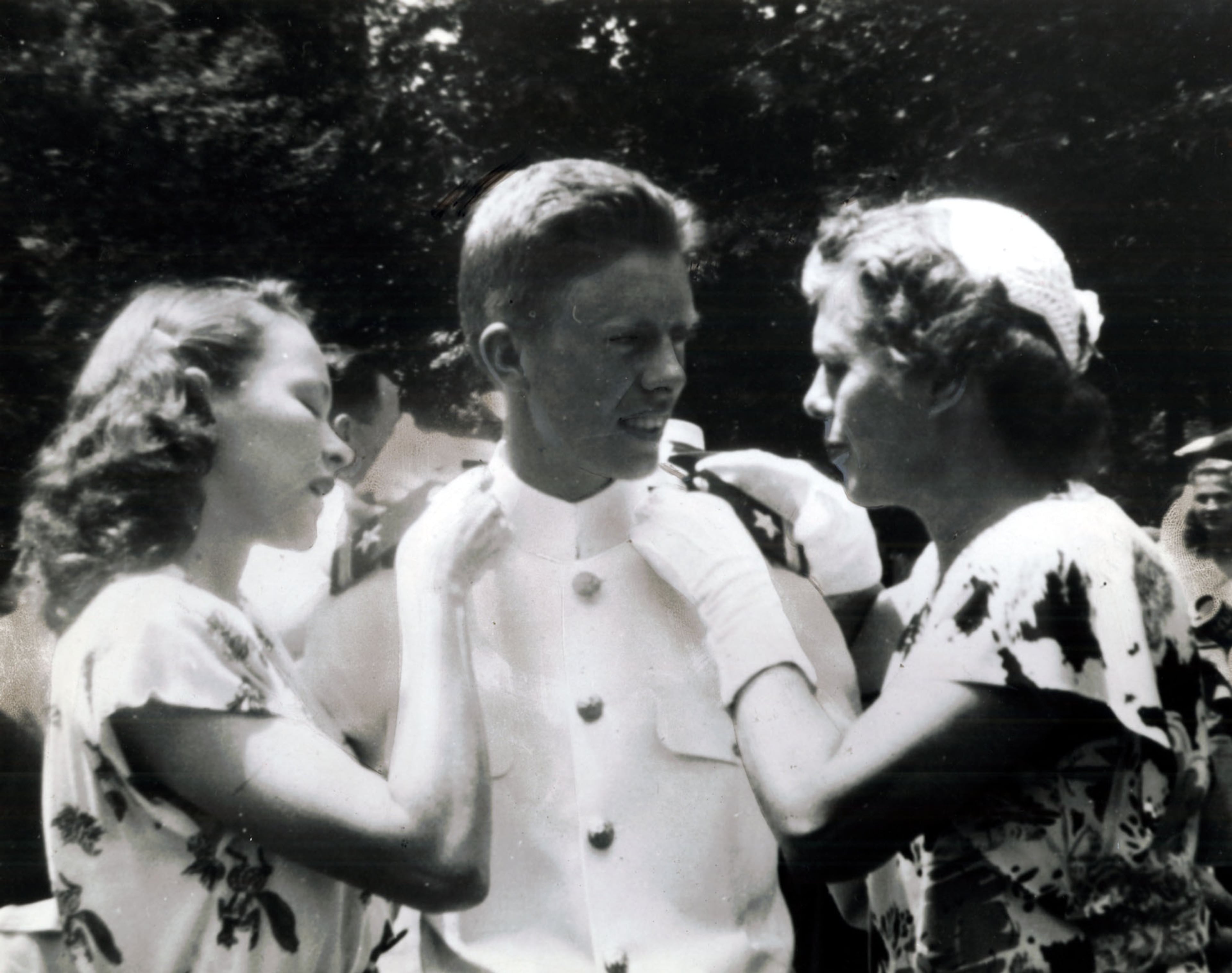 Rosalynn, Jimmy, and Lillian Carter at his Annapolis commissioning. (Chicago Sun-Times)