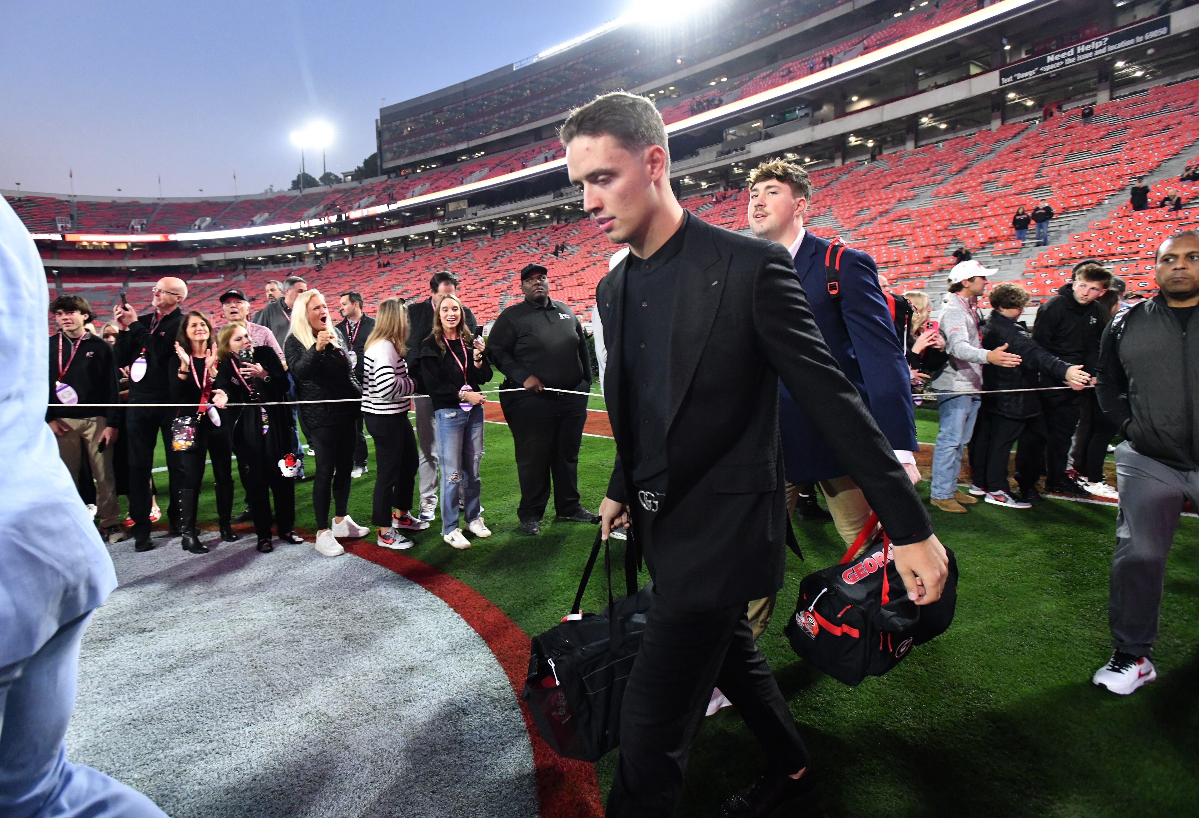 Georgia quarterback Carson Beck enters with teammates and coaching staff during Dawgs Walk before an NCAA football game between Georgia and Tennessee at Sanford Stadium, Saturday, November 16, 2024, in Athens. (Hyosub Shin / AJC)