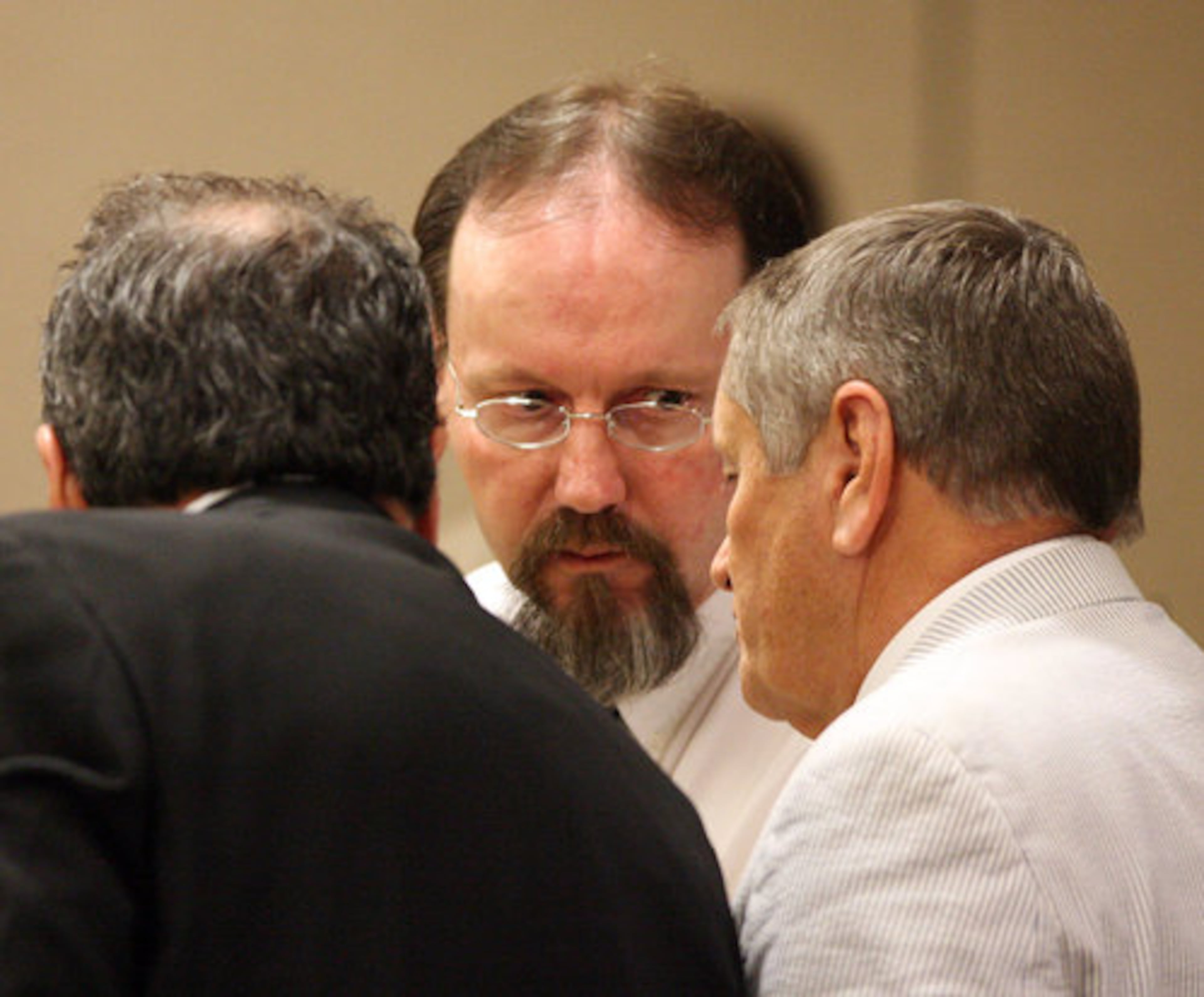 Silver Comet Trail murderer Michael Ledford (center) was sentenced Friday to death by lethal injection for the 2006 killing of Sandy Springs cyclist Jennifer Ewing.