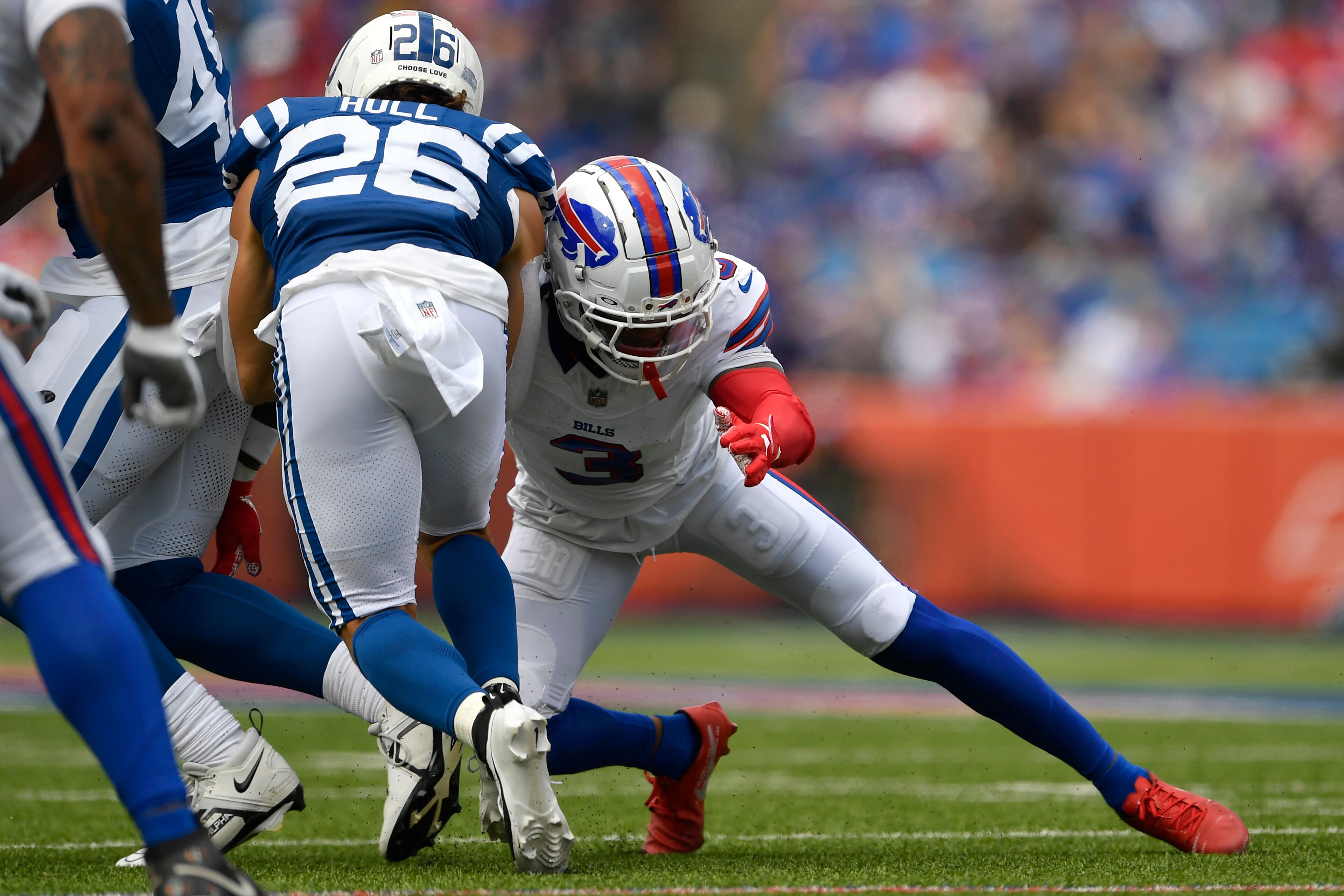 Buffalo Bills safety Damar Hamlin (3), back on the field after his scary injury last season, tackles Indianapolis Colts running back Evan Hull (26) during the first half of an NFL preseason football game in Orchard Park, N.Y., Saturday, Aug. 12, 2023. (AP Photo/Adrian Kraus)