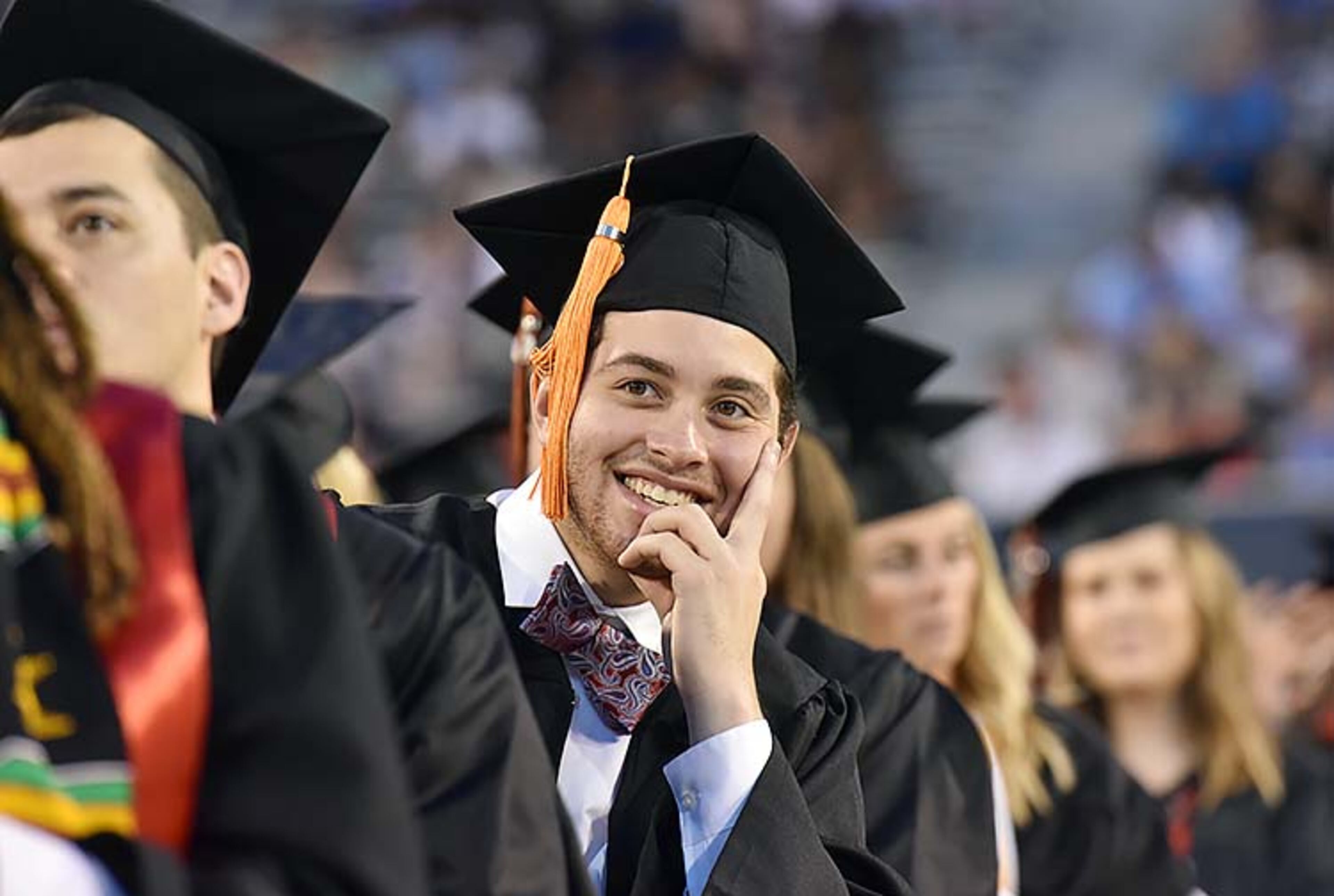 May 10, 2019 Athens - Students listen to commencement speaker Deborah Ann Roberts, news correspondent, during UGA's 2019 spring undergraduate commencement ceremony at Sanford Stadium in Athens on Friday, May 10, 2019. HYOSUB SHIN / HSHIN@AJC.COM