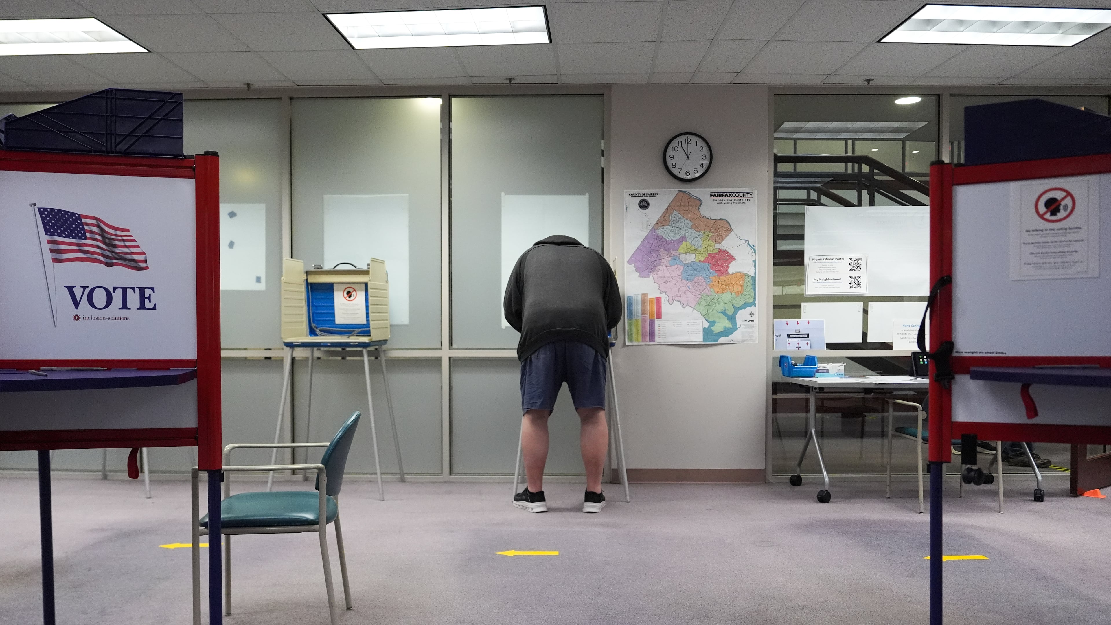 A person early votes in the Virginia redistricting referendum at the Fairfax County Government Center, Friday, April 3, 2026, in Fairfax, Va. (AP Photo/Julia Demaree Nikhinson)