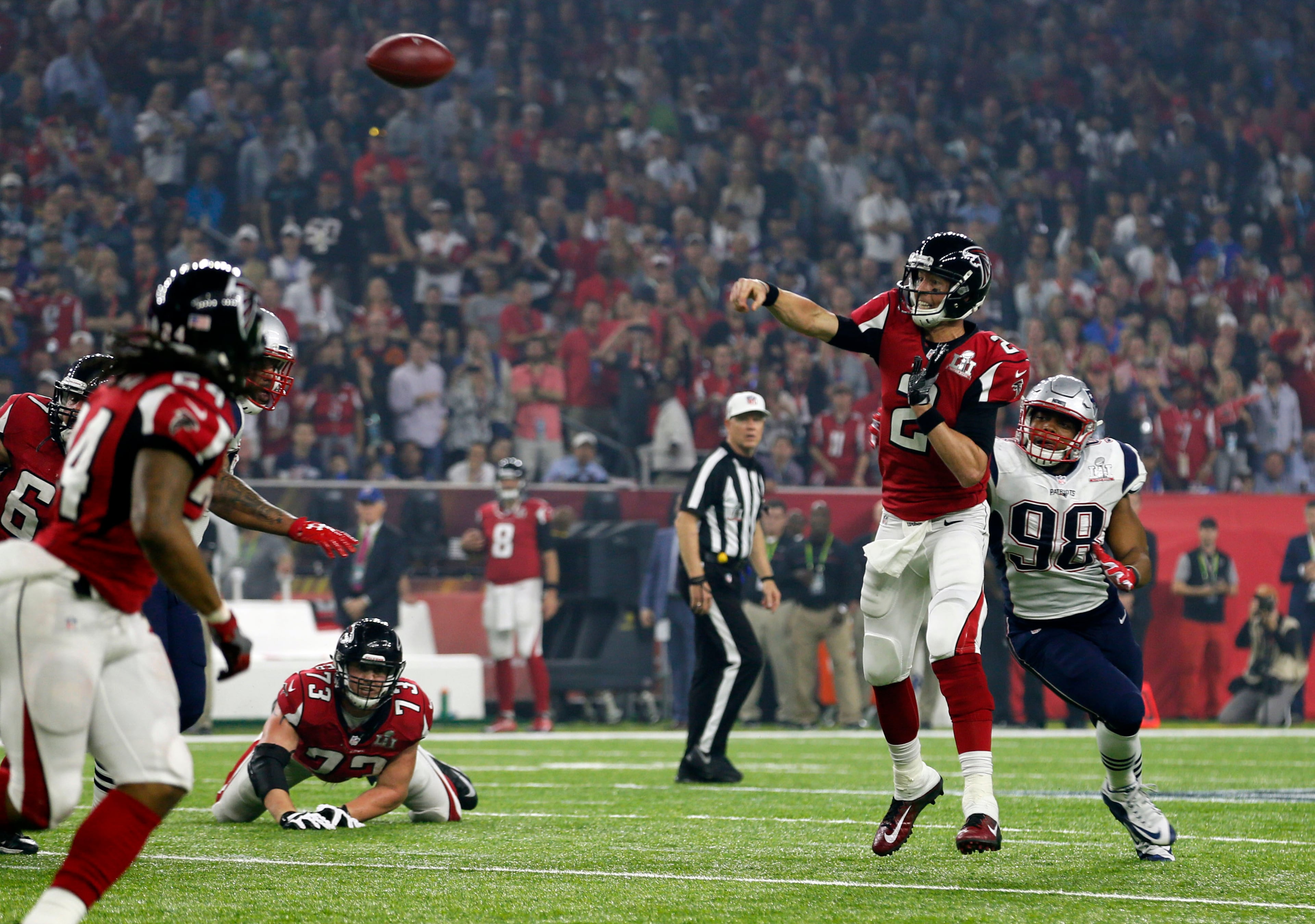 FEBRUARY 5, 2017 HOUSTON TX Atlanta Falcons quarterback Matt Ryan (2) passes to Atlanta Falcons wide receiver Mohamed Sanu (12) in the 3rd quarter as the Atlanta Falcons meet the New England Patriots in Super Bowl LI at NRG Stadium in Houston, TX, Sunday, February 5, 2017. Bob Andres/AJC