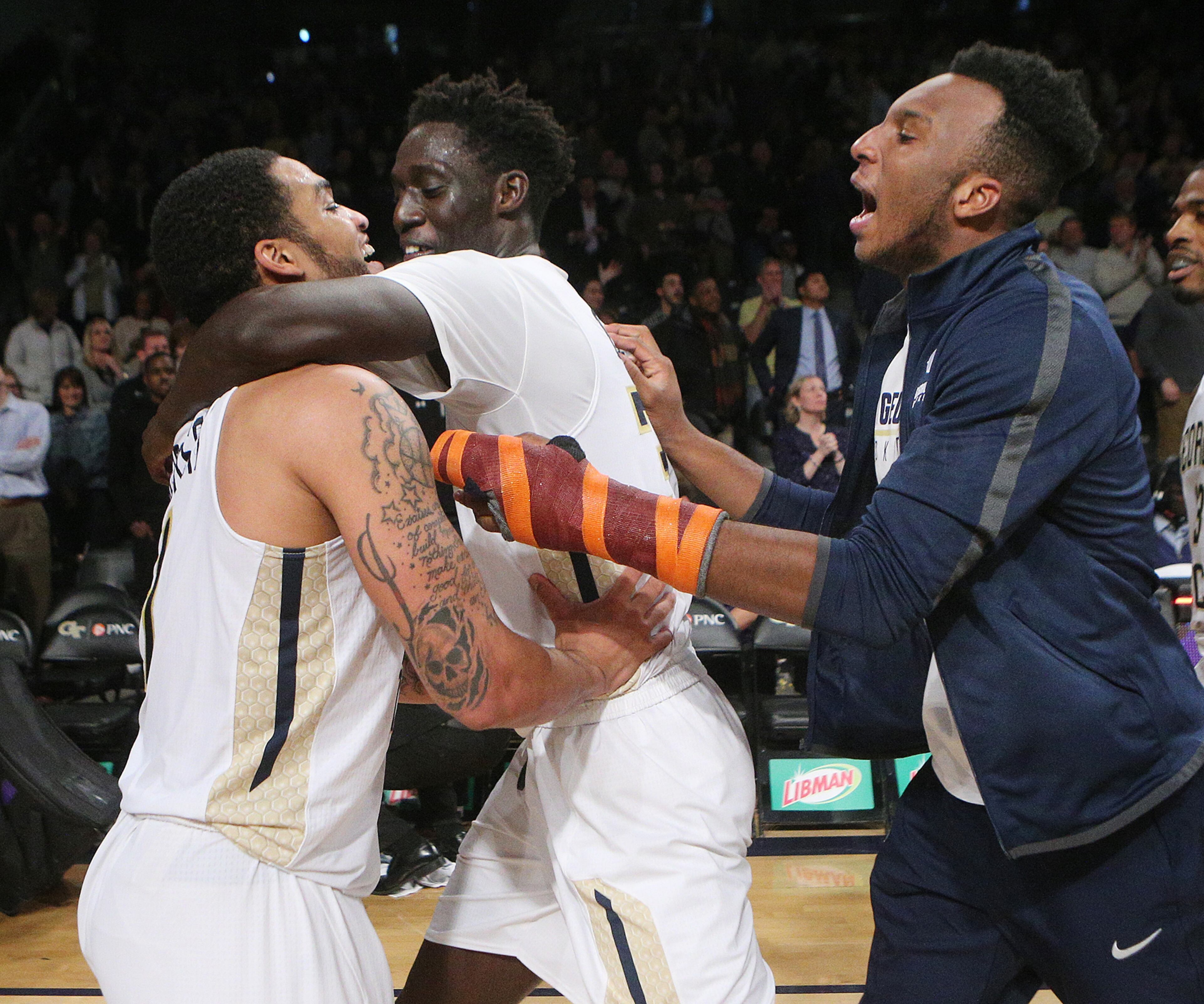 November 28, 2017 Atlanta: Georgia Tech guard Tadric Jackson (from left) celebrates his game winning shot for a 52-51 victory over Northwestern with Abdoulaye Gueye and injured guard Josh Okogie in a NCAA college basketball game on Tuesday, November 28, 2017, in Atlanta. Curtis Compton/ccompton@ajc.com