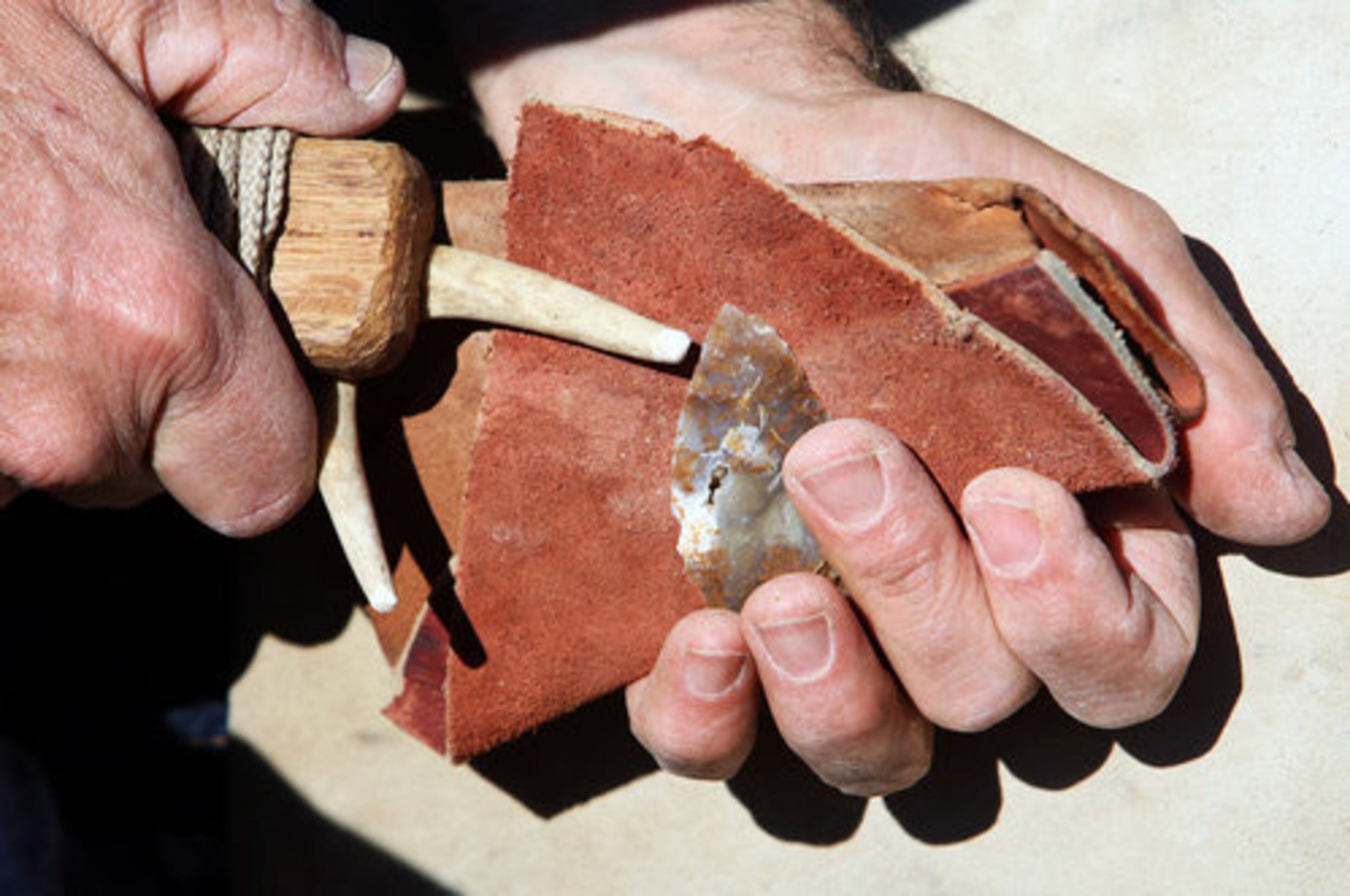 Scott Jones demonstrates flint napping while making arrow heads.