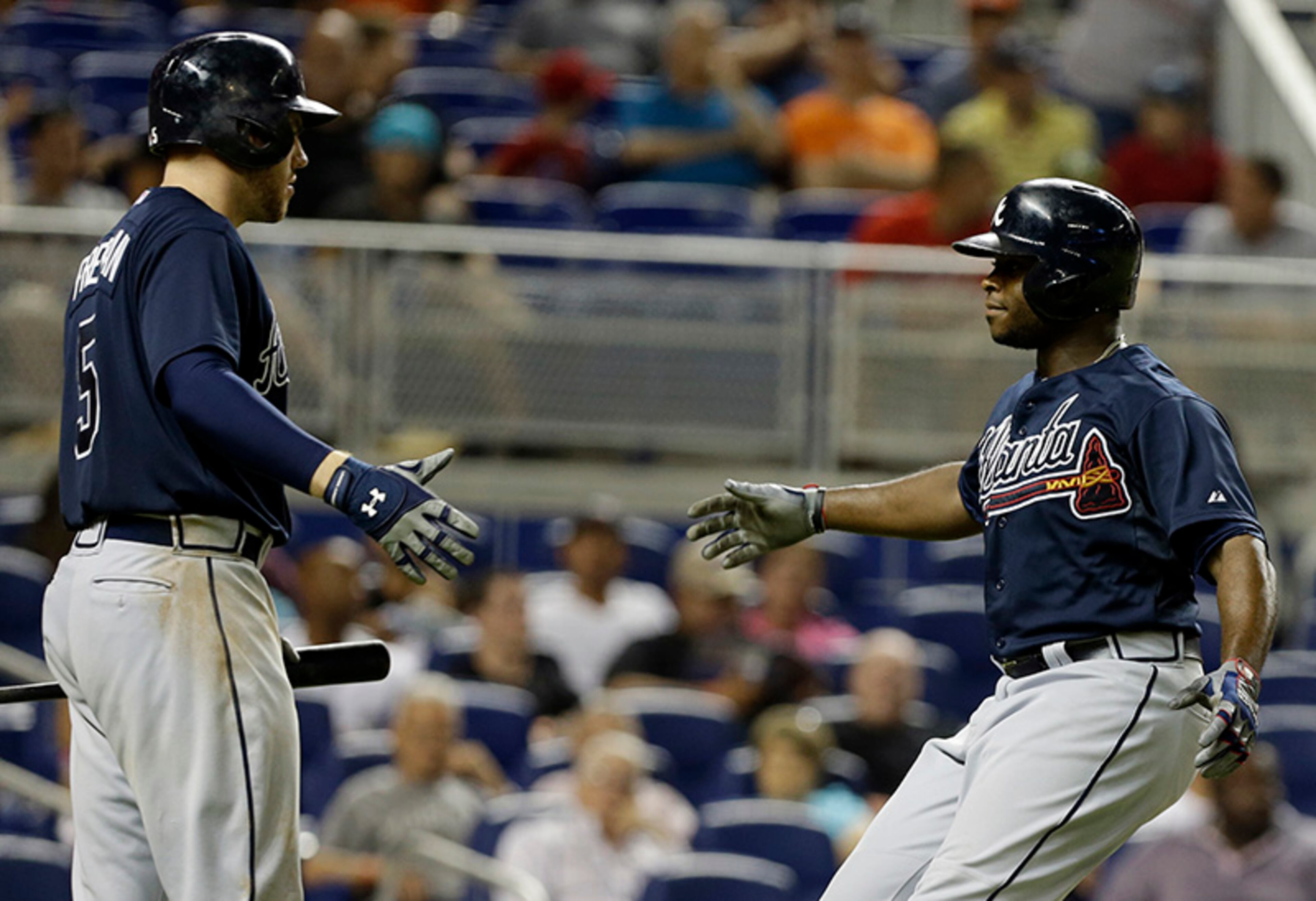 430 feet - Justin Upton hit a solo shot off Marlins reliever Ryan Webb to left-center in the 7th inning - his second homer at Marlins Park this season. The Braves win 6-4.