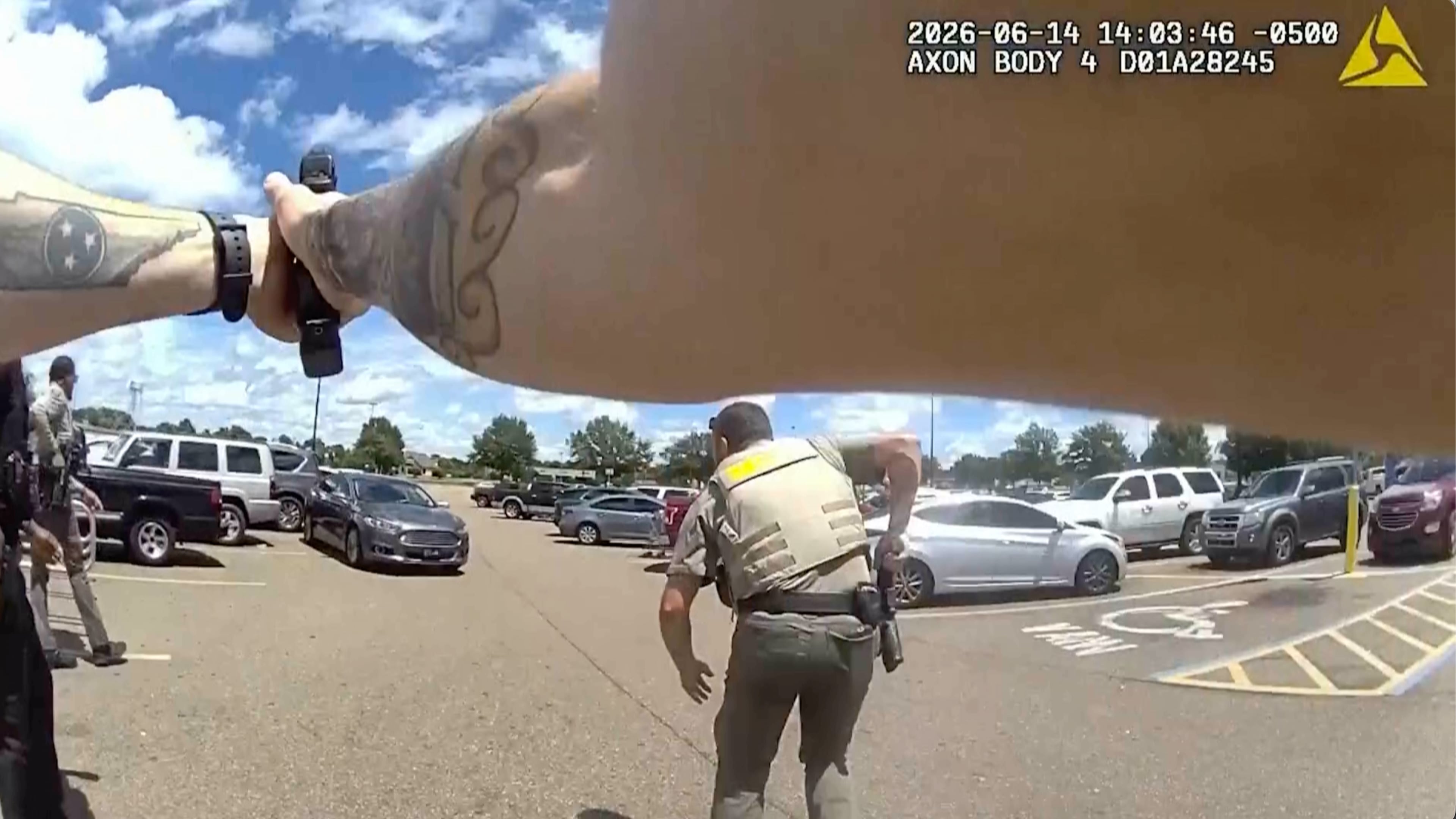 This image provided by the Mississippi Department of Public Safety shows body-camera footage of officers responding to a scene where a 1-year-old boy was shot by law enforcement in Senatobia, Miss., on June 14, 2026. (Mississippi Department Of Public Safety via AP)
