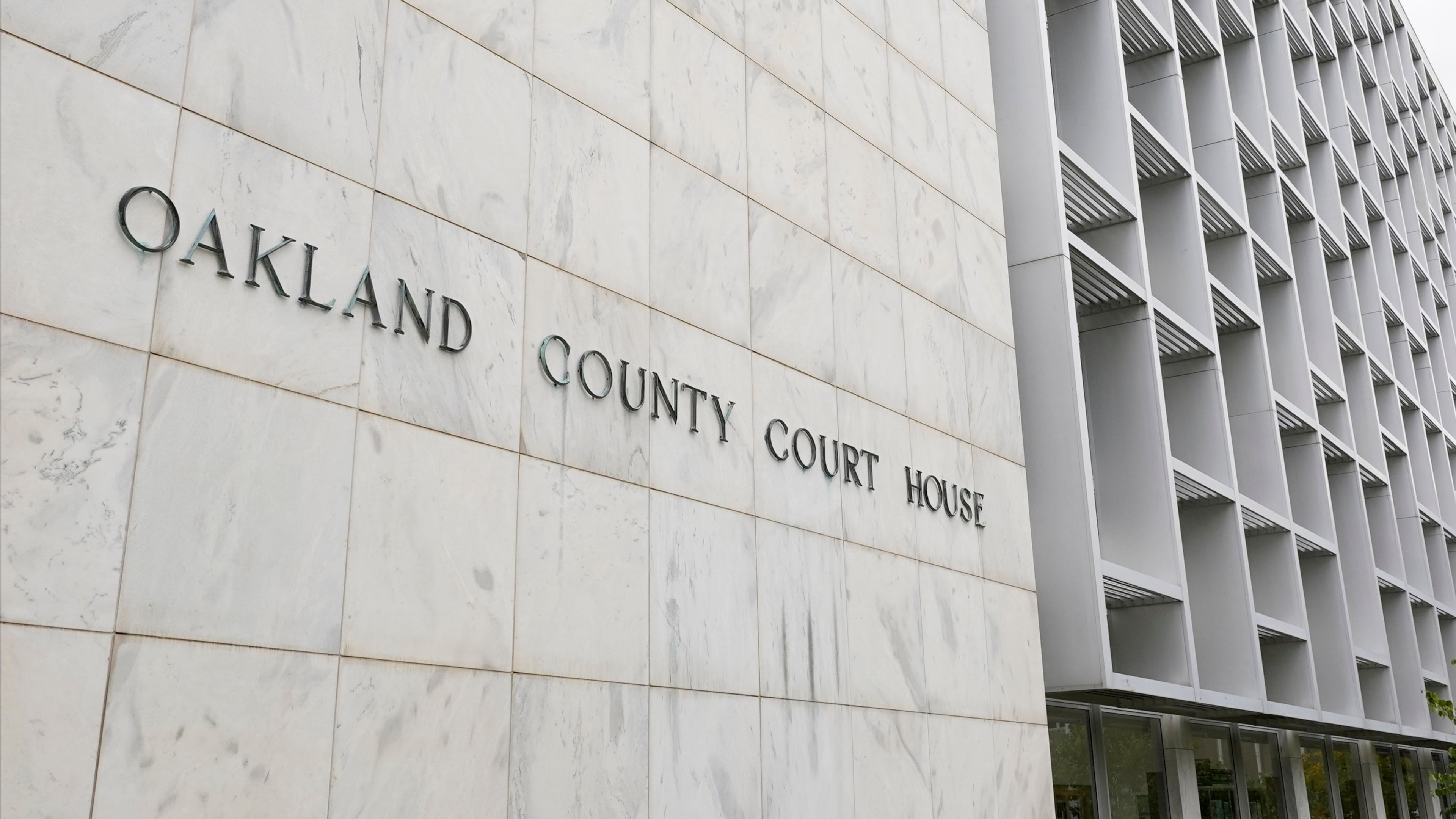 FILE - An Oakland County Courthouse building is shown in Pontiac, Mich., Oct. 19, 2020. (AP Photo/Paul Sancya, File)