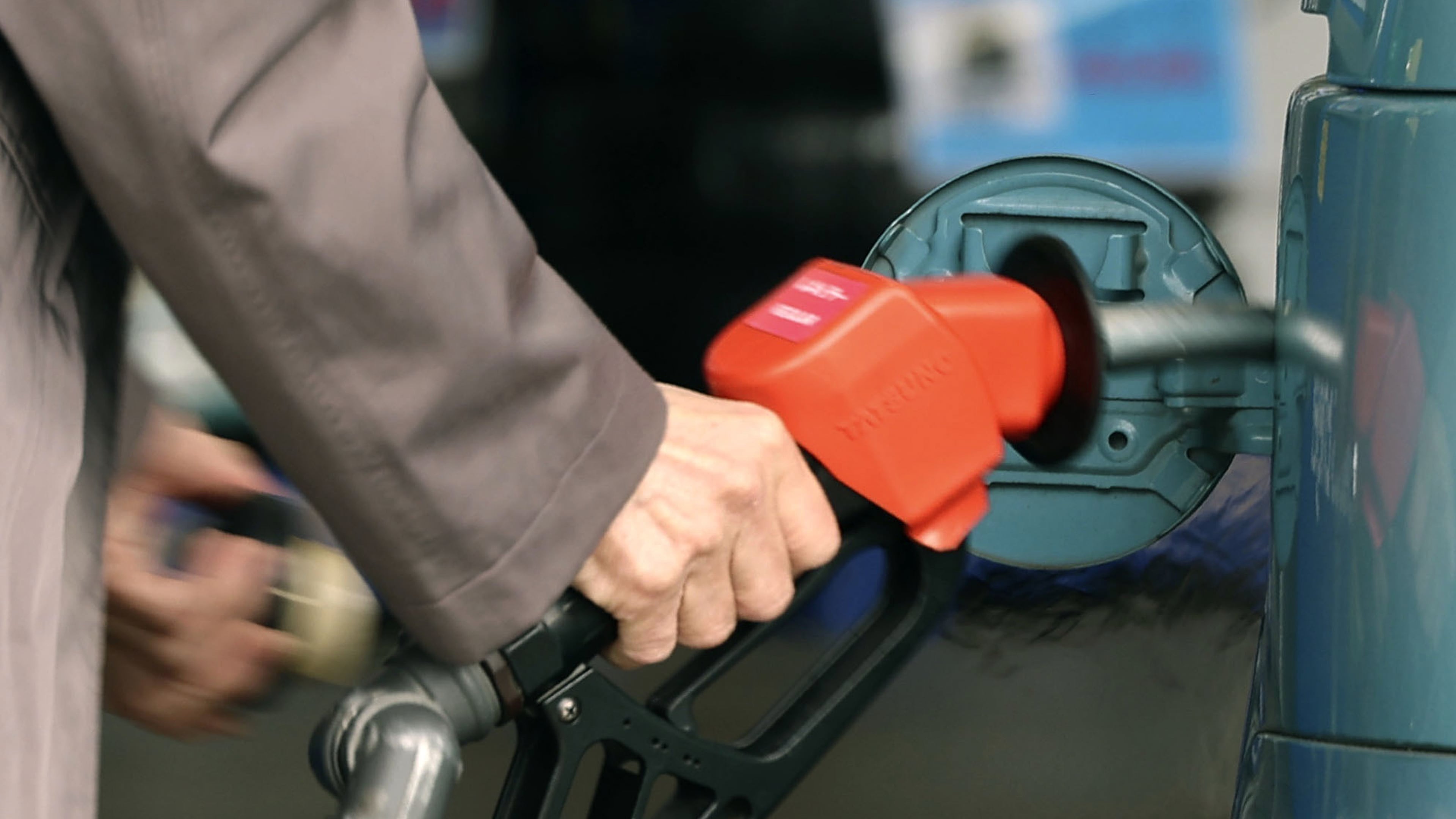 A customer fills up the tank of a vehicle at a gasoline station in Tokyo, on March 18, 2026. (Naoki Kawano/Kyodo News via AP)