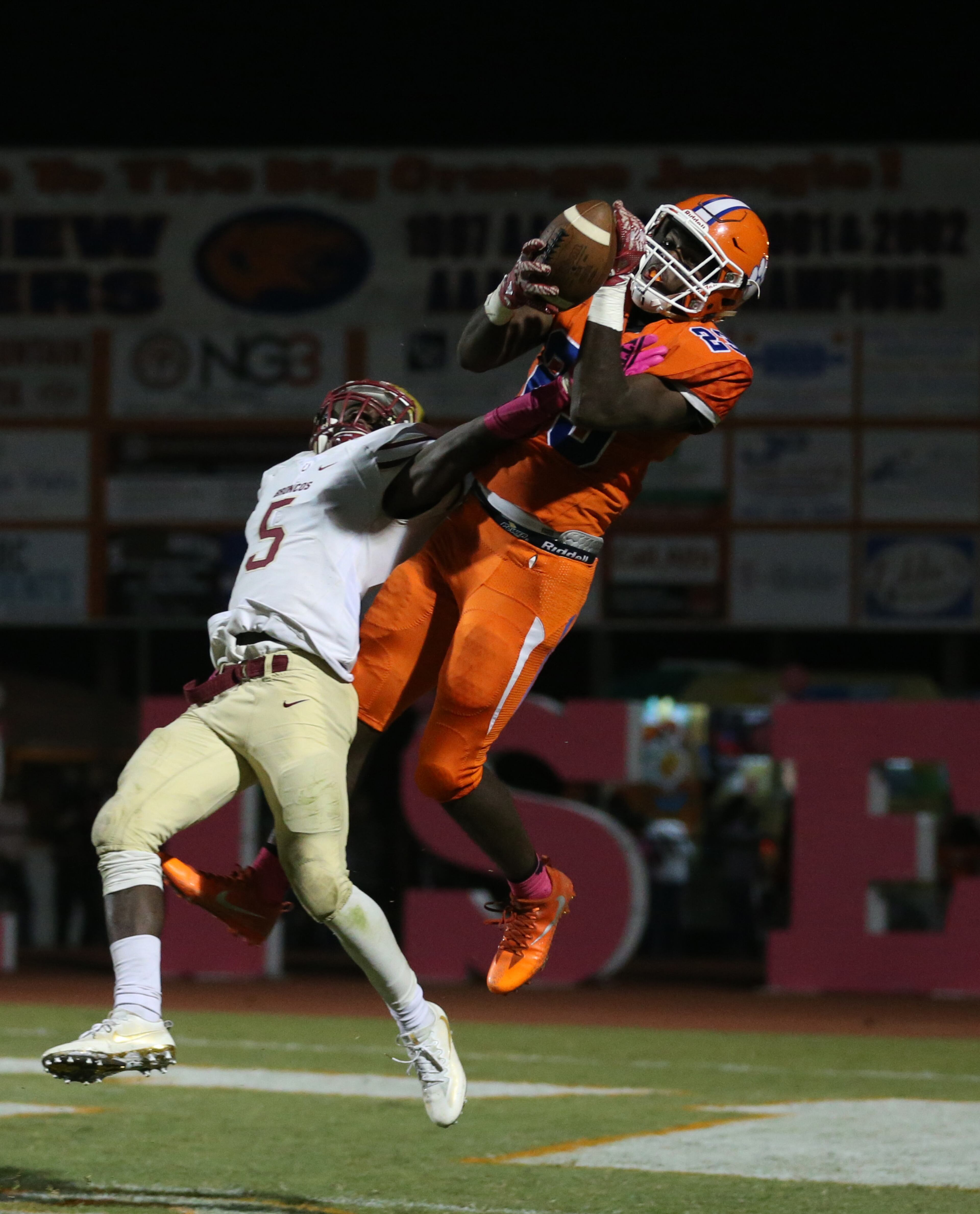 October 20, 2017 - Lilburn, Ga: Parkview wide receiver Miles Marshall (23) catches a touchdown pass against Brookwood defensive back Caleb Riley (5) in the second half of their game at Parkview High School Friday, October 20, 2017, in Lilburn, Ga.. Brookwood won 30-27. PHOTO / JASON GETZ