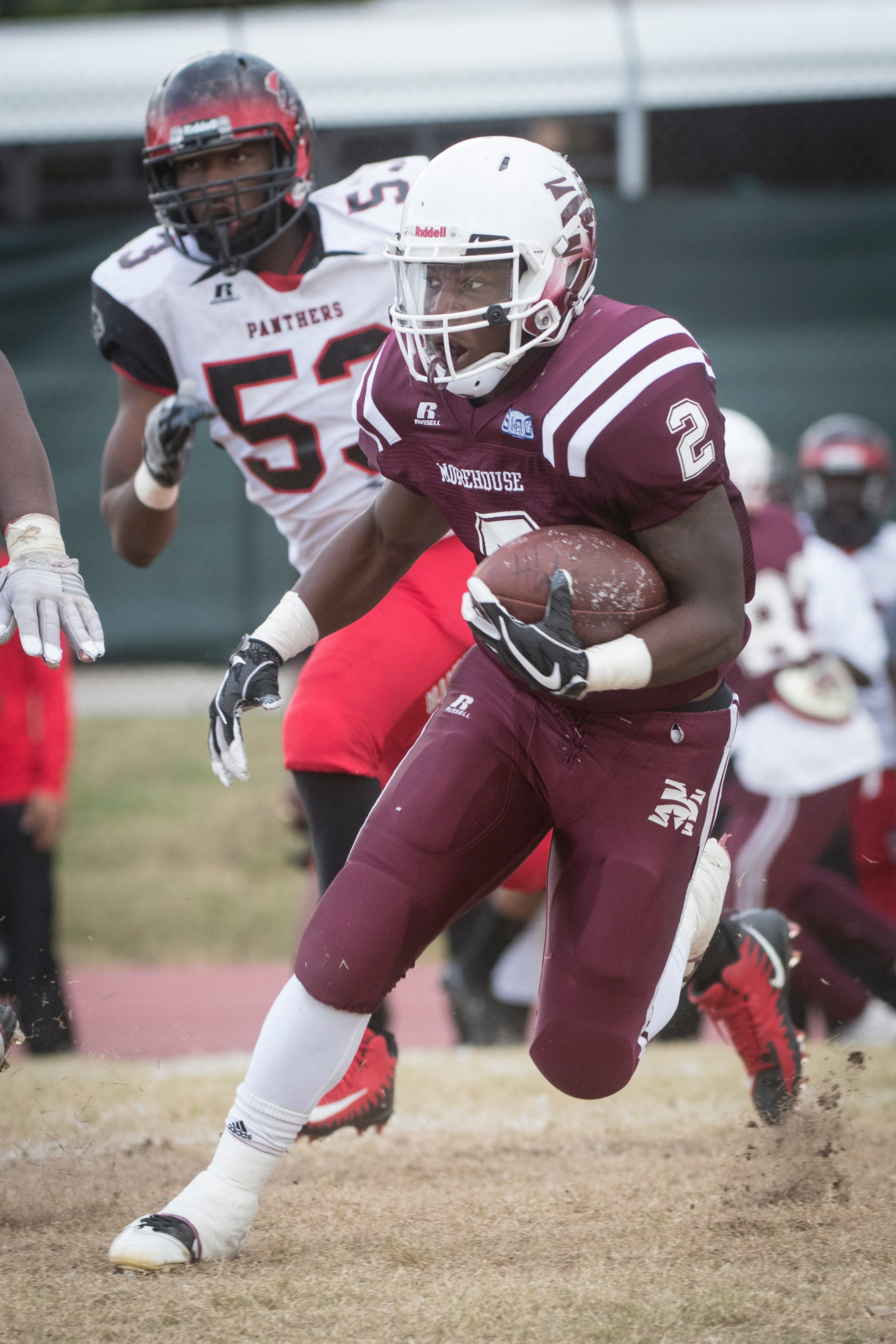 Morehouse defensive back Eric Robinson (2) runs as Clark Atlanta linebacker Brent Granger (53) gives chase during a college football game on Saturday, Nov. 4, 2017, in Atlanta. (John Amis)