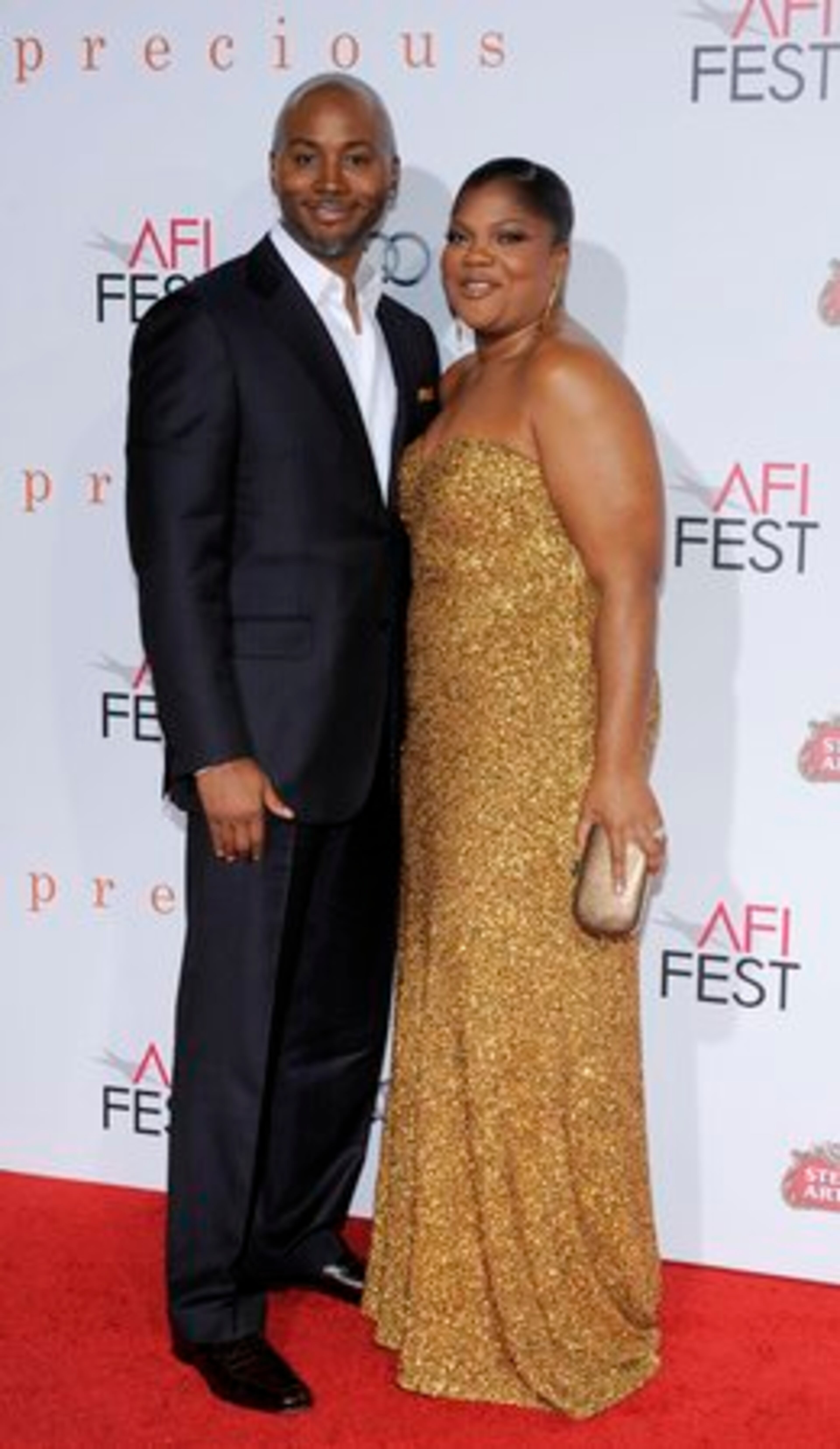 Mo'Nique, right, a cast member in "Precious: Based on the Novel 'Push' by Sapphire, " poses with her husband Sidney Hicks.