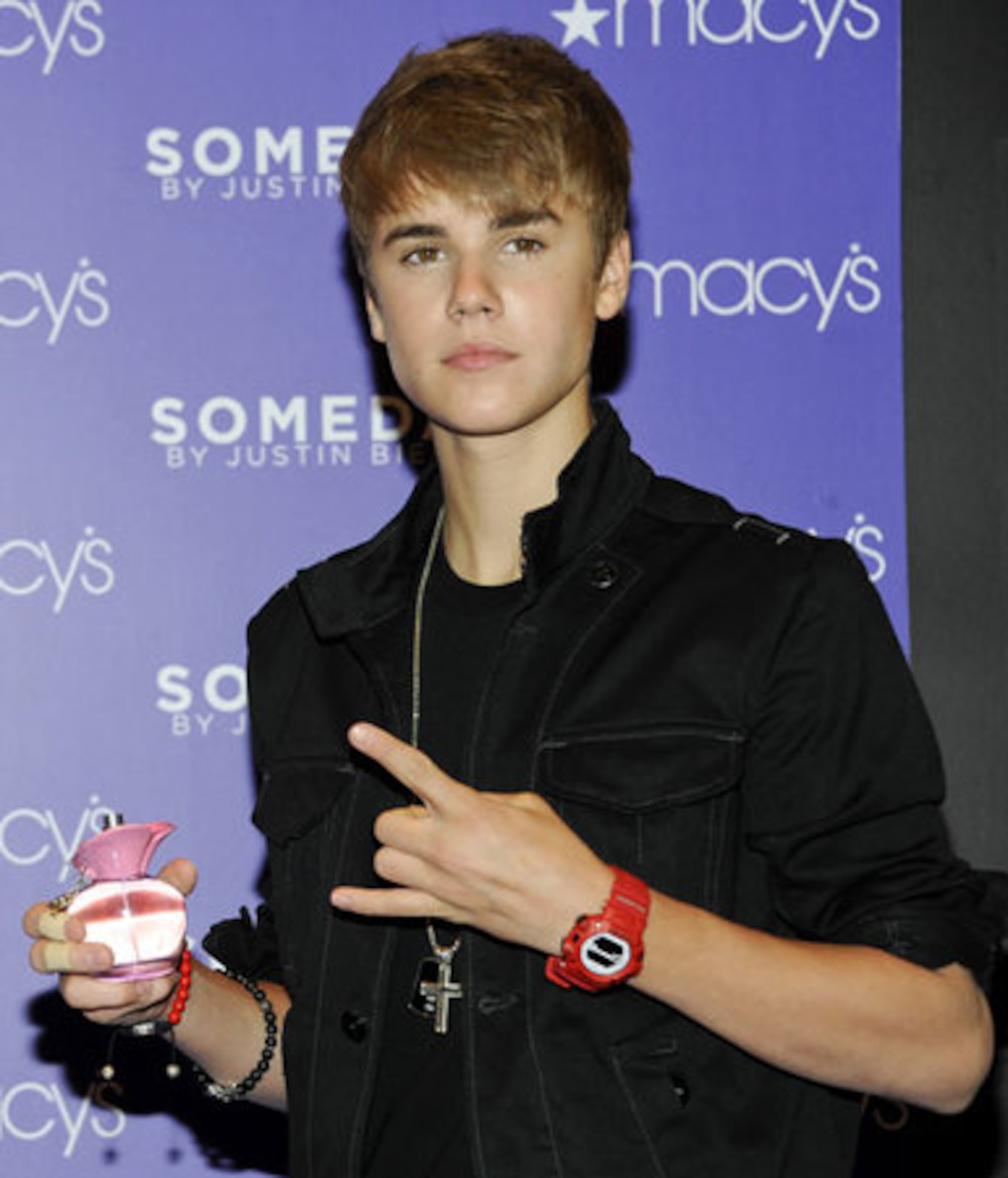 Around 500 people had gathered outside to catch a glimpse of the Biebs, so the singer bypassed the area police had secured for Bieber, which caused the crowd to lunge toward him. A man jumped over the barricade, which was surely scary for teenage fans, but TMZ reports that the man was actually a plainclothes police officer. Guards stepped in and removed the man and secured Bieber. No one was hurt -- including the perfume bottle.