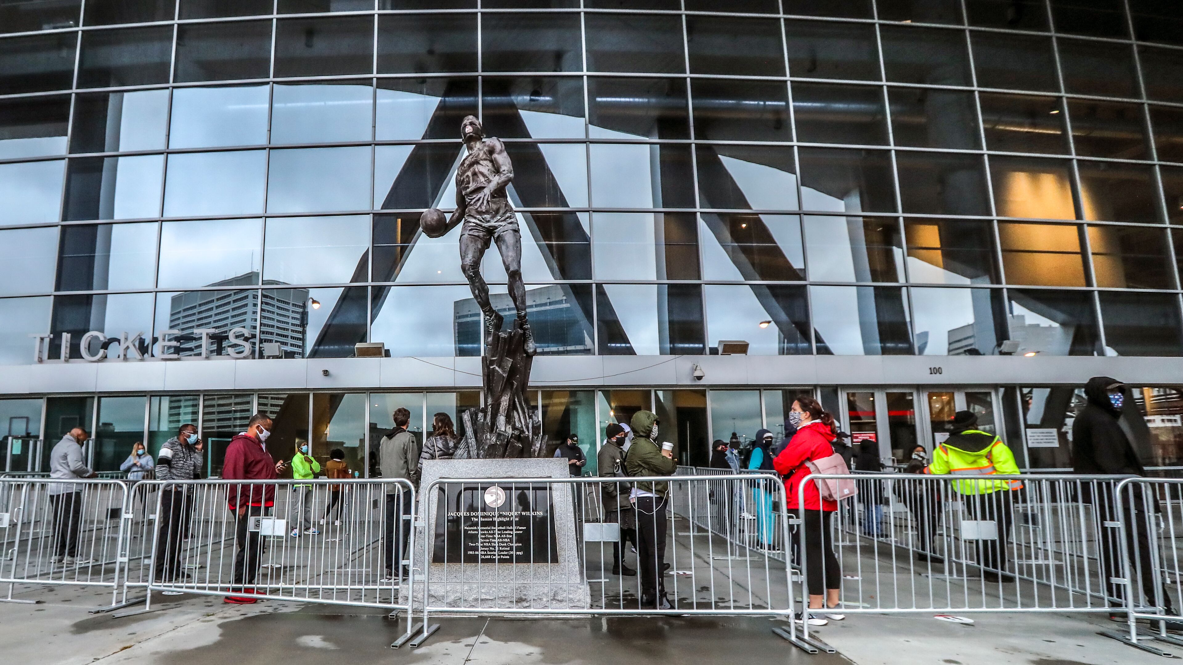 December 14, 2020 Atlanta: Voters came to State Farm Arena on Monday, Dec. 14, 2020 to cast their votes to determine which political party controls the U.S. Senate on the first day of early voting. Both of Georgia’s Senate seats are up for grabs as Republican incumbent Sens. David Perdue and Kelly Loeffler try to hold of Democratic challengers Jon Ossoff and Raphael Warnock. Democrats would need to win both seats to flip control of the Senate. Early voting started at 8:30 a.m. in Fulton County. Thirty-two voting locations are open and listed on the Fulton County website. Early voting locations were also open elsewhere in the state, including in Cobb, DeKalb and Gwinnett counties. Early voters may cast their ballot at any location in their county. In Fulton County, weekday voting hours are 8:30 a.m.-6 p.m. through Dec. 23. Hours are extended to 7 a.m.-7 p.m. from Dec. 28-30. On Saturdays, Dec. 19 and Dec. 26, voting will be held 8:30 a.m.-6 p.m. On Sundays, Dec. 20 and Dec. 27, voting locations are open noon-6 p.m. Voting locations include State Farm Arena from Dec. 14-19; and Mercedes-Benz Stadium from Dec. 22-Dec. 30. Wait time estimates at polling locations will available on the Fulton County website and the Fulton Votes mobile app, an official said. Polls will be closed Dec. 24-25 and Dec. 31-Jan. 1 in observance of the Christmas and New Year’s holidays. Election Day is Tuesday, Jan. 5. (John Spink / John.Spink@ajc.com)
