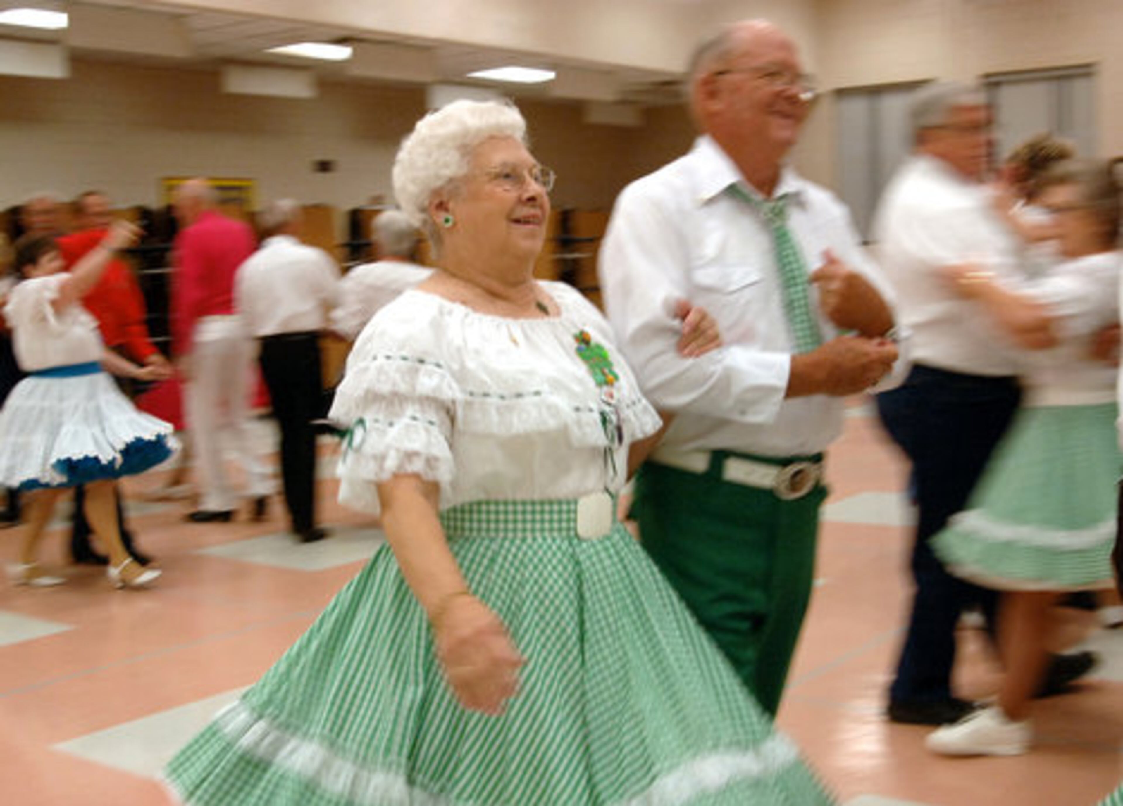 Square dancing has European roots but is considered a popular American dance because it developed into many different styles in this country. This dance involves a caller leading many couples on the dance floor to perform various moves and generates fun and fellowship for all involved.