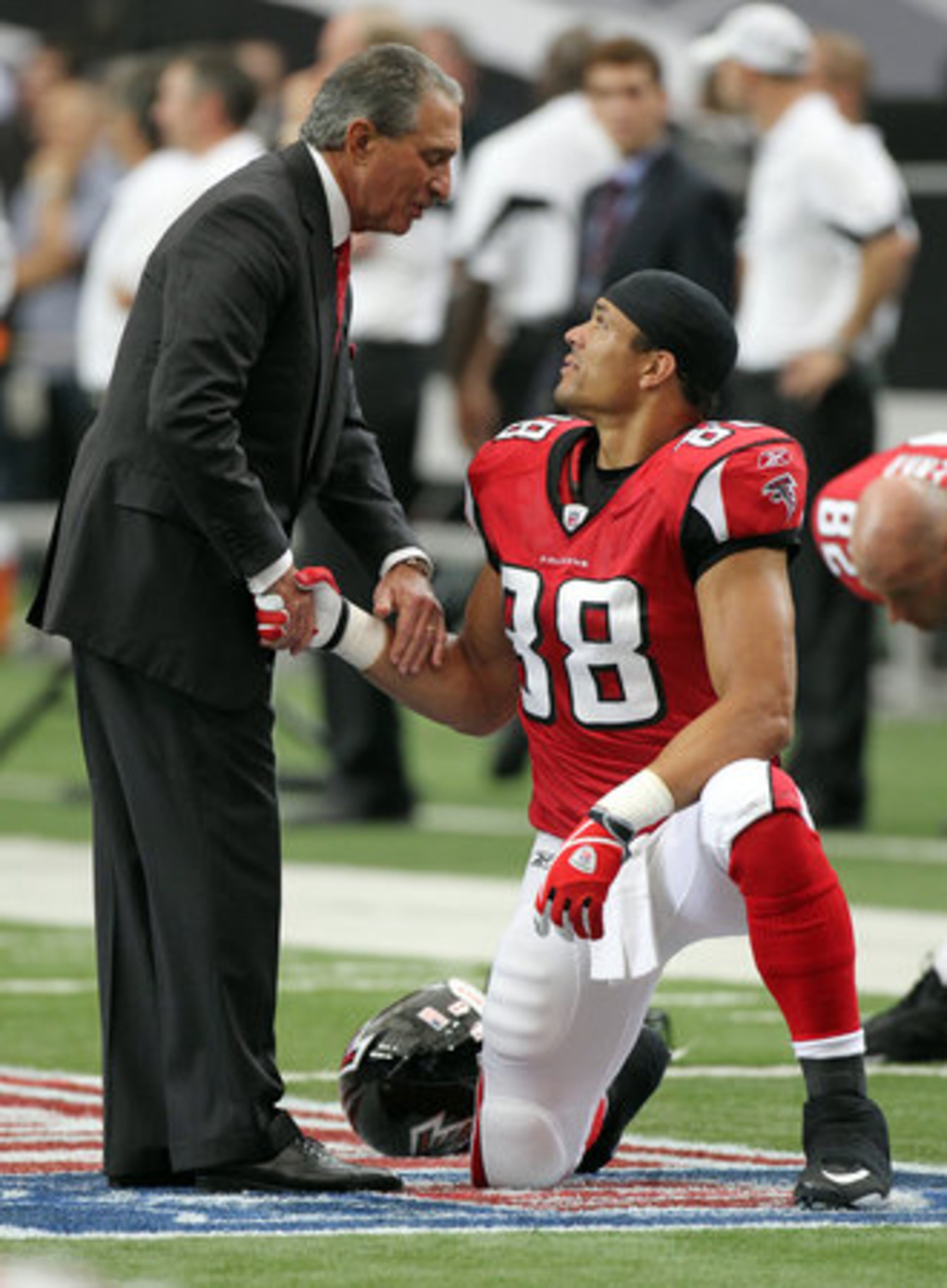 "Tony Gonzalez Day" - Atlanta Falcons team owner Arthur Blank honors tight end Tony Gonzalez with a pregame ceremony commemorating his 1,000th catch at the Georgia Dome in Atlanta on Sunday, Sept. 19, 2010.