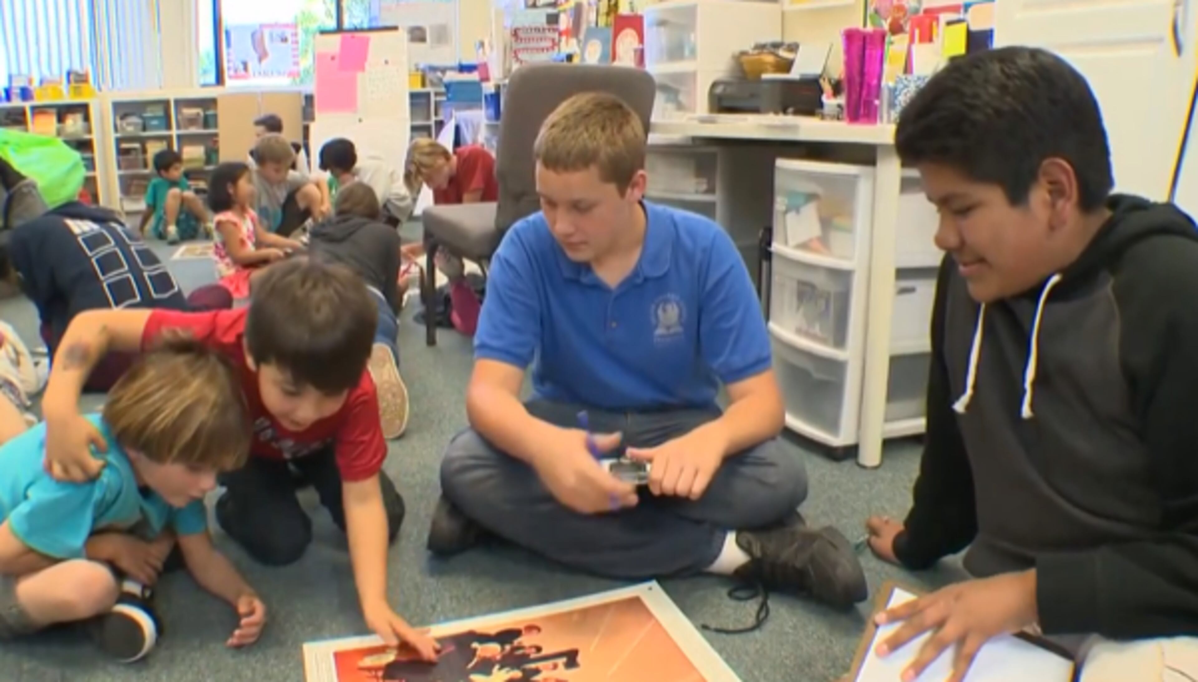 Students at one of the San Diego area’s JCS hybrid charter schools work together. The schools grew out of a program that met in a barn northeast of the city with 400 students, most of them homeschoolers. (Courtesy of Jennifer Cauzza)