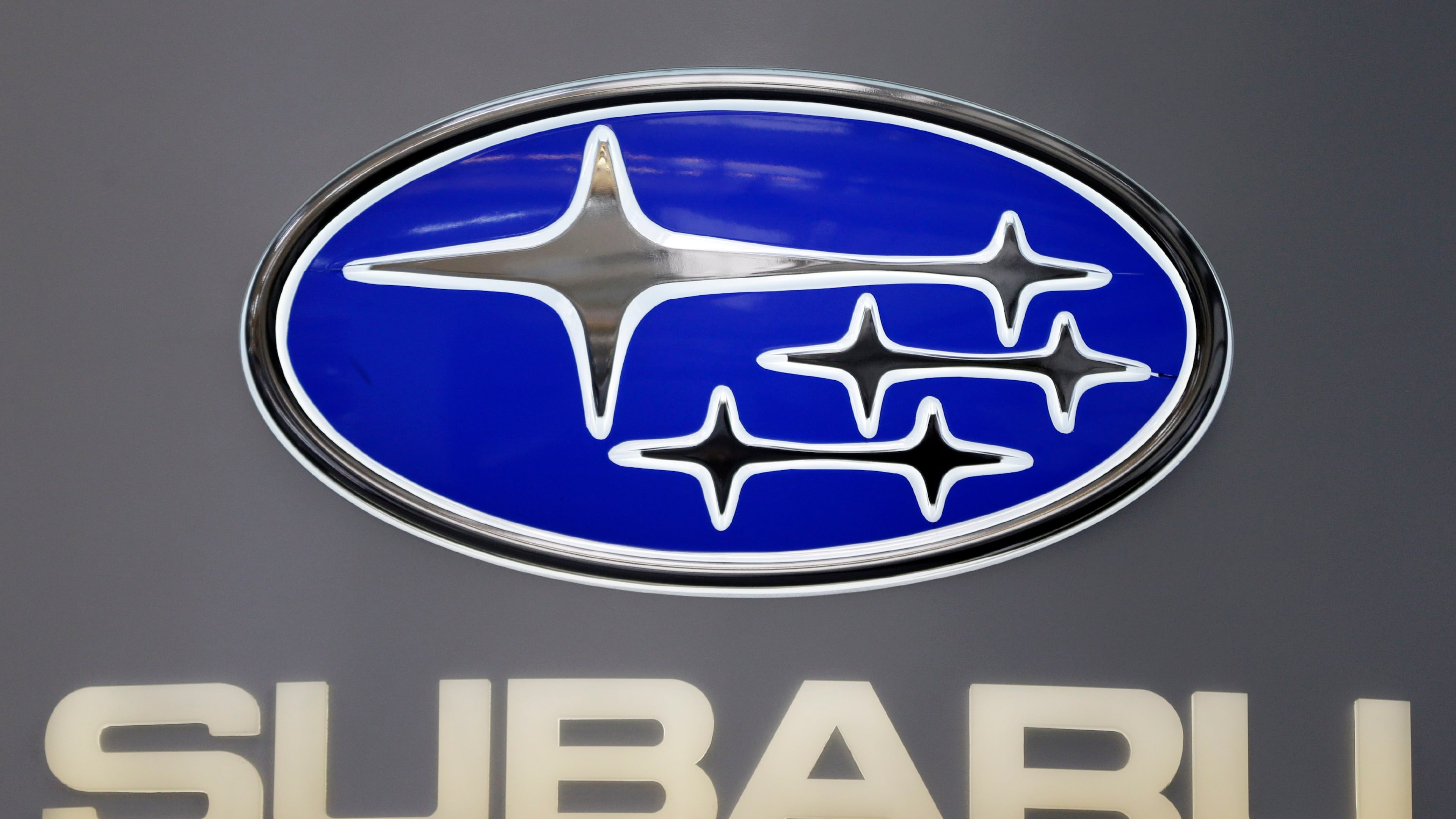 FILE - This Photo taken Feb. 14, 2013 shows a Subaru logo at the 2013 Pittsburgh Auto Show in Pittsburgh. (AP Photo/Gene J. Puskar, File)