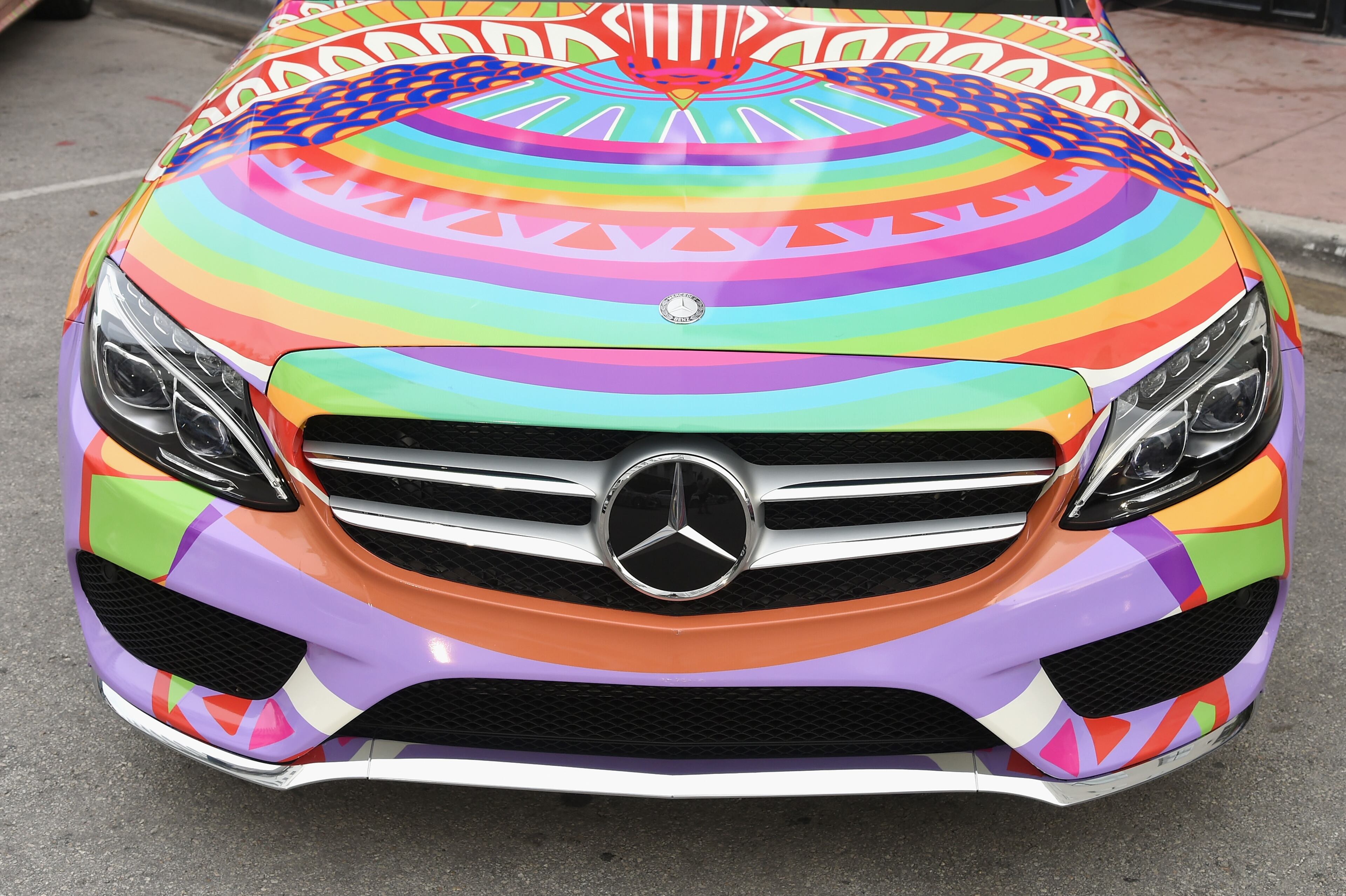 MIAMI BEACH, FL - JULY 17: A 2015 Mercedes-Benz C-Class featuring an exclusive design by Mara Hoffman on display during Mercedes-Benz Fashion Week Swim 2015 at The Raleigh on July 17, 2014 in Miami Beach, Florida. (Photo by Andrew H. Walker/Getty Images for Mercedes-Benz Fashion Week )
