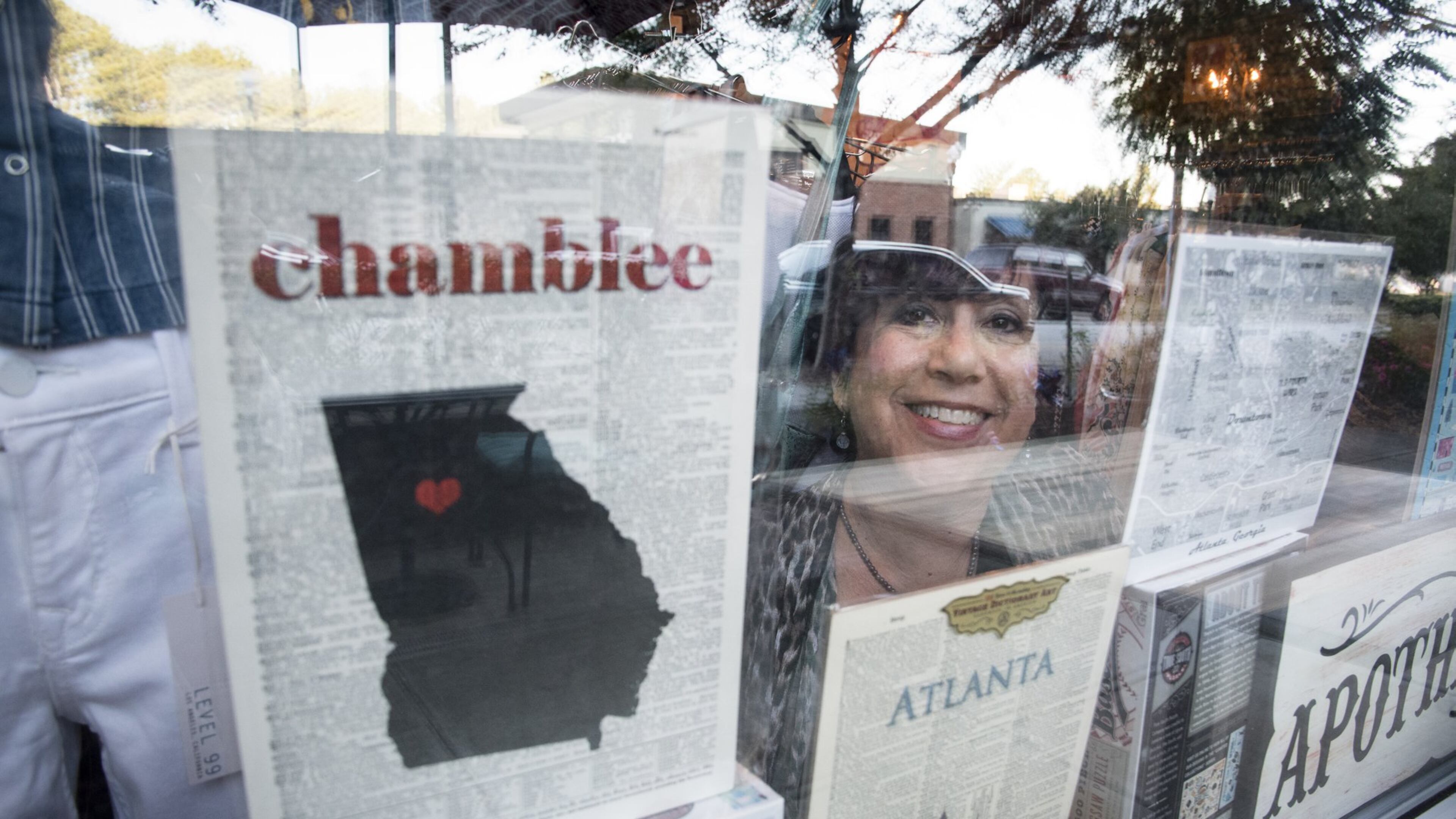Kim Fredrickson, pictured inside her store, which is called ‘Hello Gorgeous.’ She says the neighborhood is changing and growing. (John Amis)