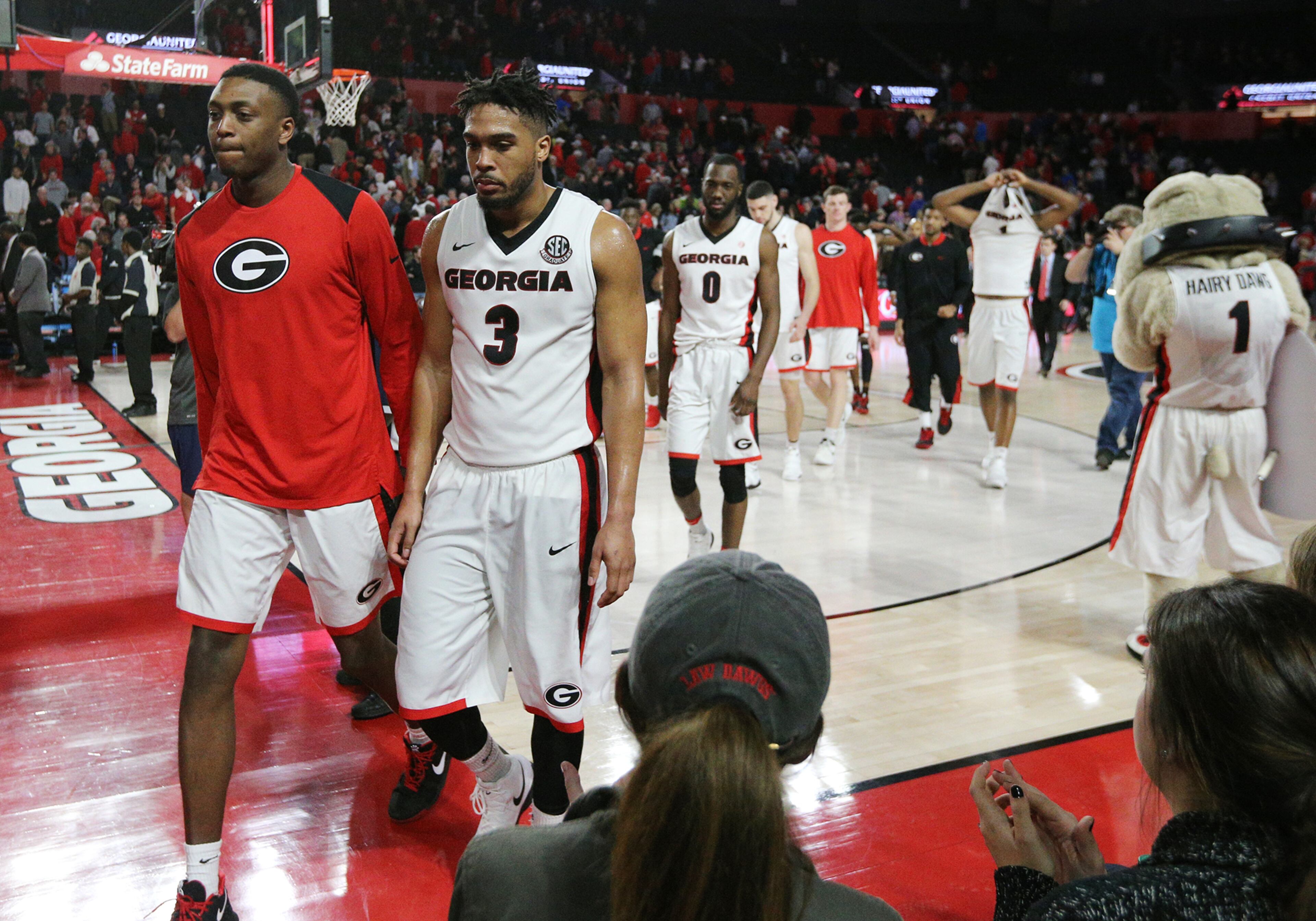 Feb 28, 2018 Athens: Georgia guard Juwan Parker (right) and teammates walk off the court falling 61-60 to Texas A&M in their final home game of the season on Wednesday, Feb 28, 2018, in Athens. Curtis Compton/ccompton@ajc.com