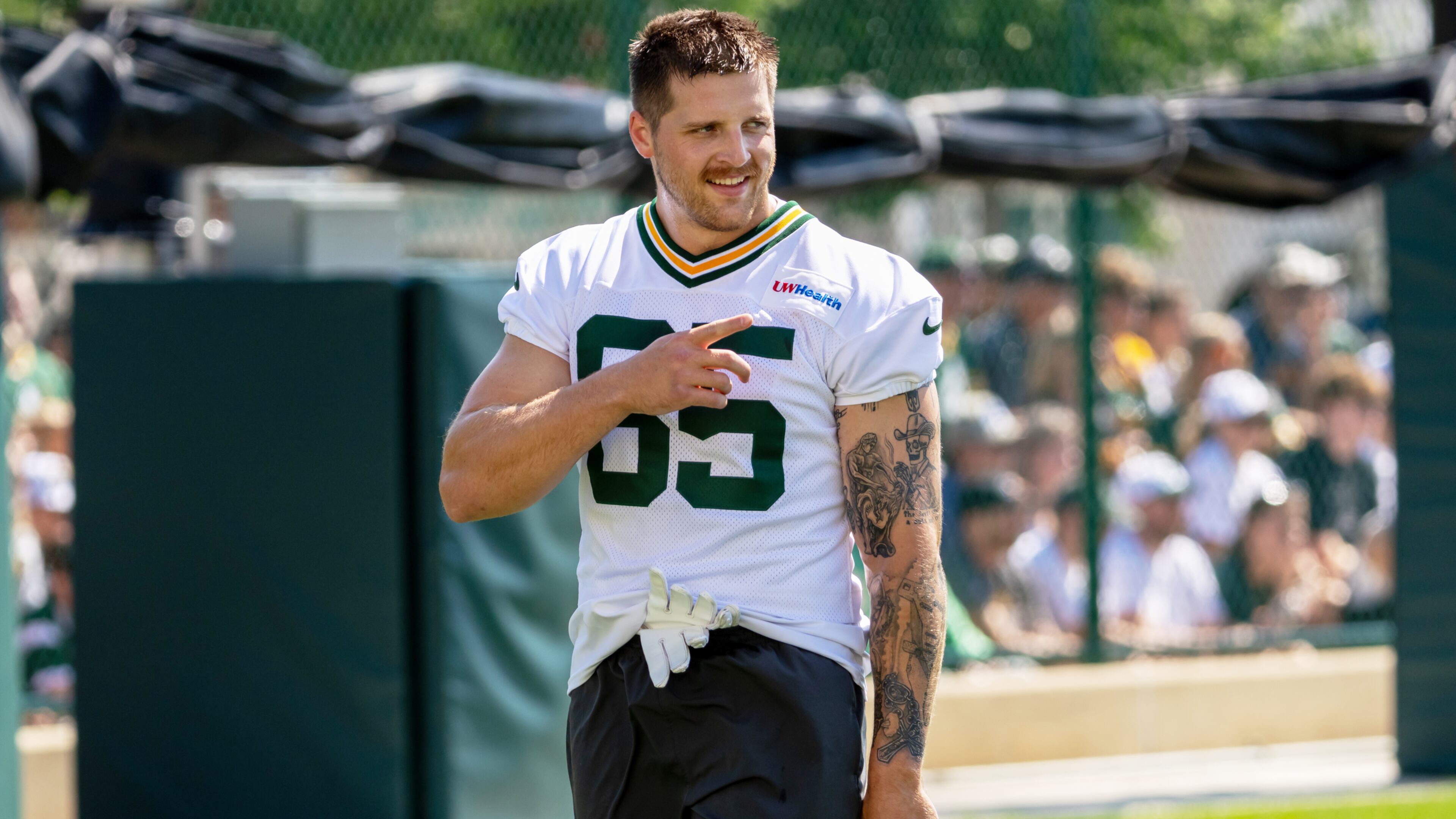 FILE - Green Bay Packers tight end Tucker Kraft points during the NFL football team's training camp, Aug. 2, 2026, in Green Bay, Wis. (AP Photo/Mike Roemer, File)