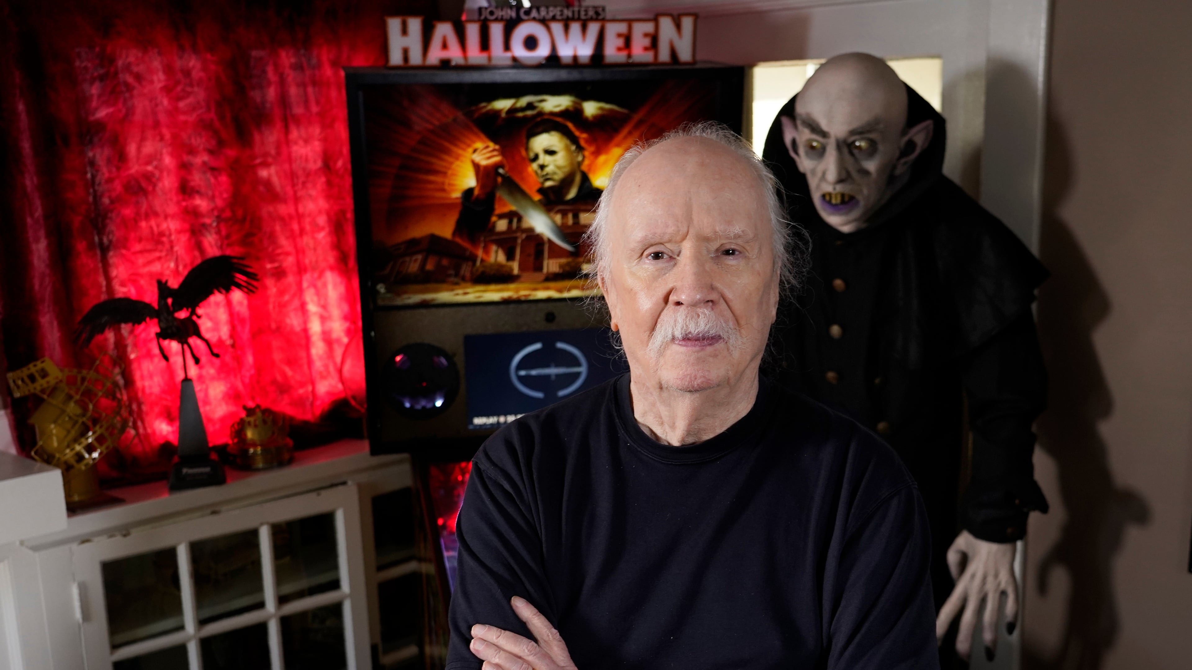 FILE - Author-filmmaker John Carpenter appears at his office in Los Angeles on Oct. 3, 2023. (AP Photo/Chris Pizzello, File)