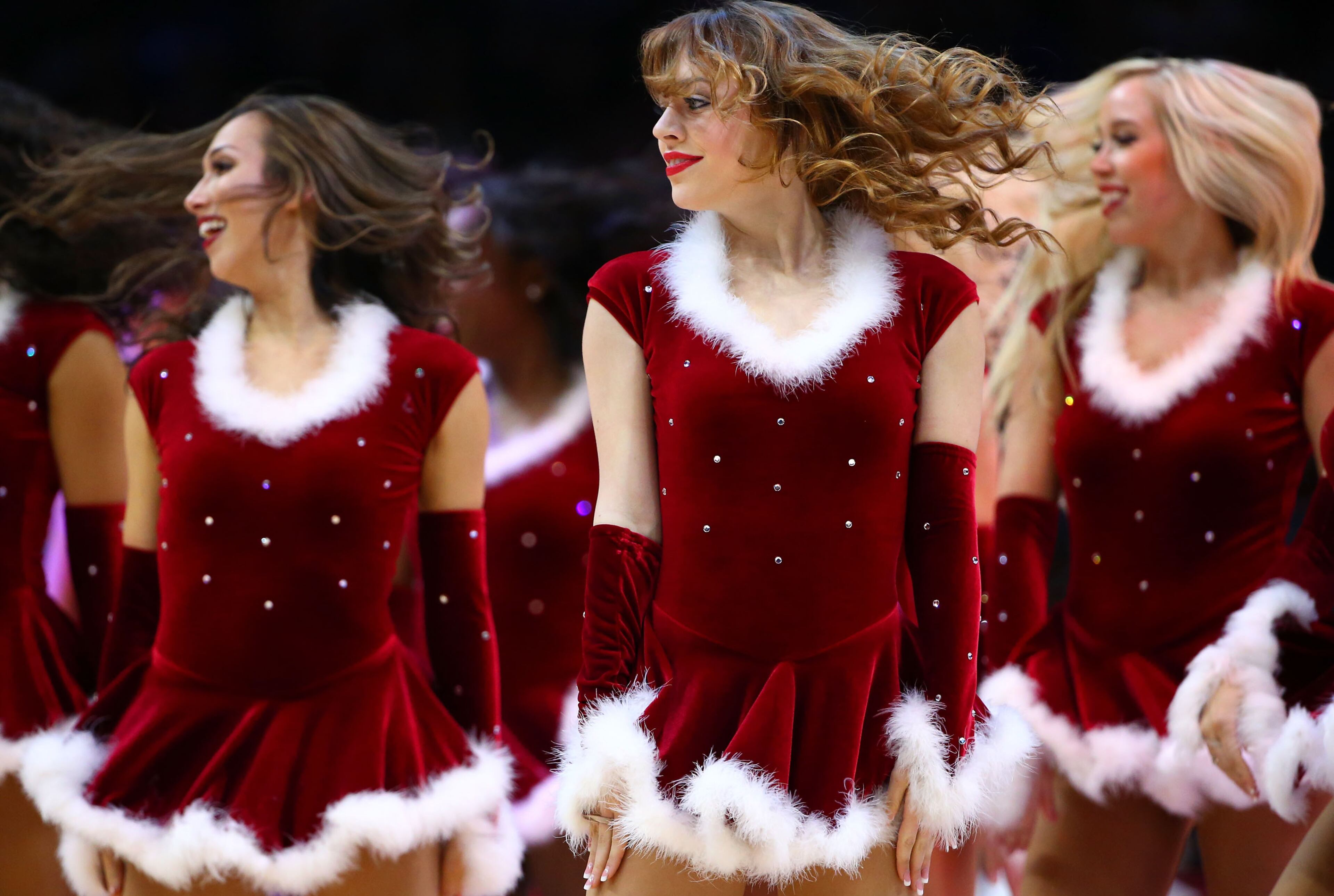 LOS ANGELES, CA - DECEMBER 25: Los Angeles Clippers dancers perform during a break in the NBA game between the Los Angeles Clippers and the Golden State Warriors at Staples Center on December 25, 2014 in Los Angeles, California. NOTE TO USER: User expressly acknowledges and agrees that, by downloading and/or using this photograph, user is consenting to the terms and conditions of the Getty Images License Agreement. Mandatory copyright notice. (Photo by Victor Decolongon/Getty Images)