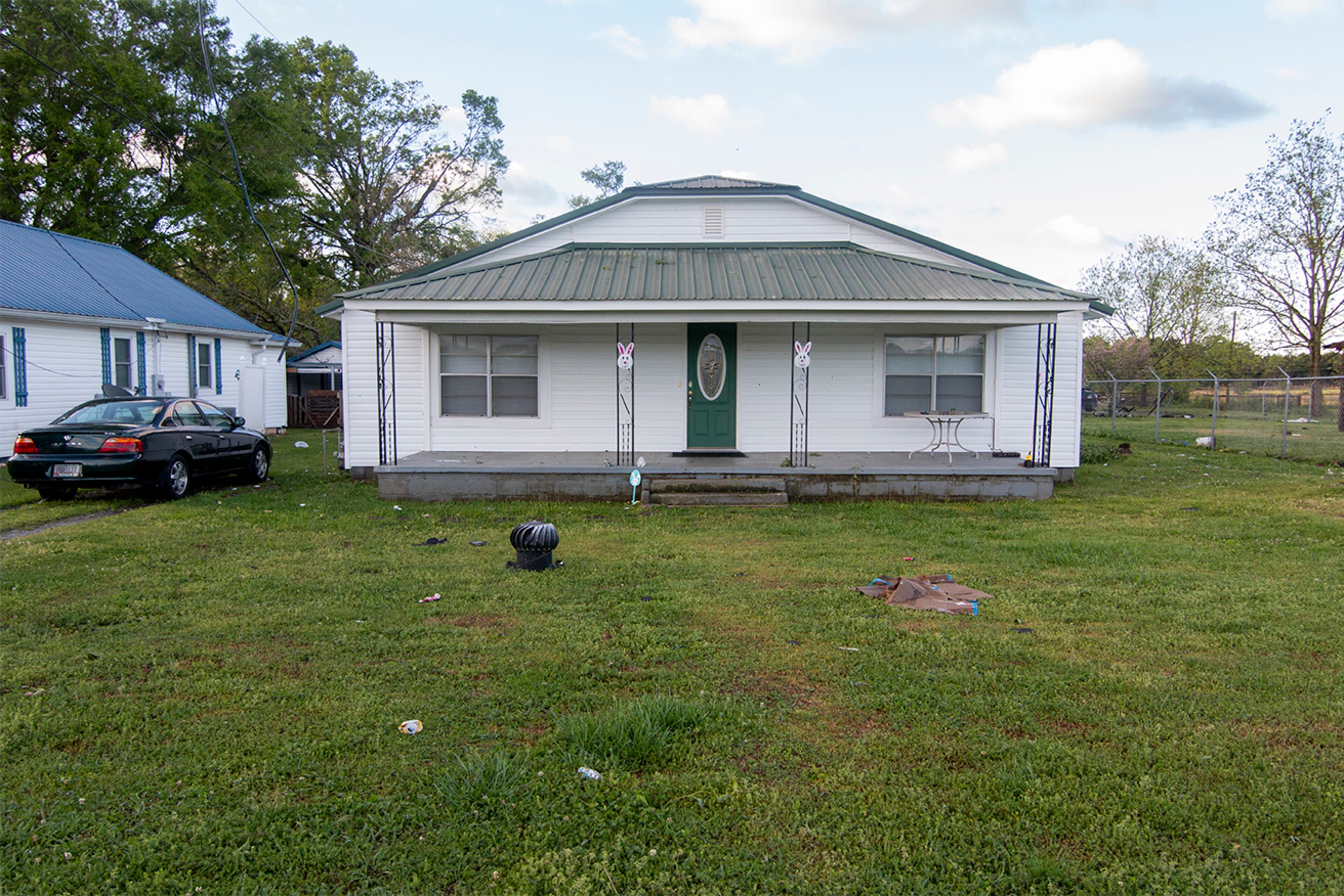 13.04.20 A roof turbine vent sits in a front yard after a tornado ripped through Chatooga county. Photo by Matthew McConnell