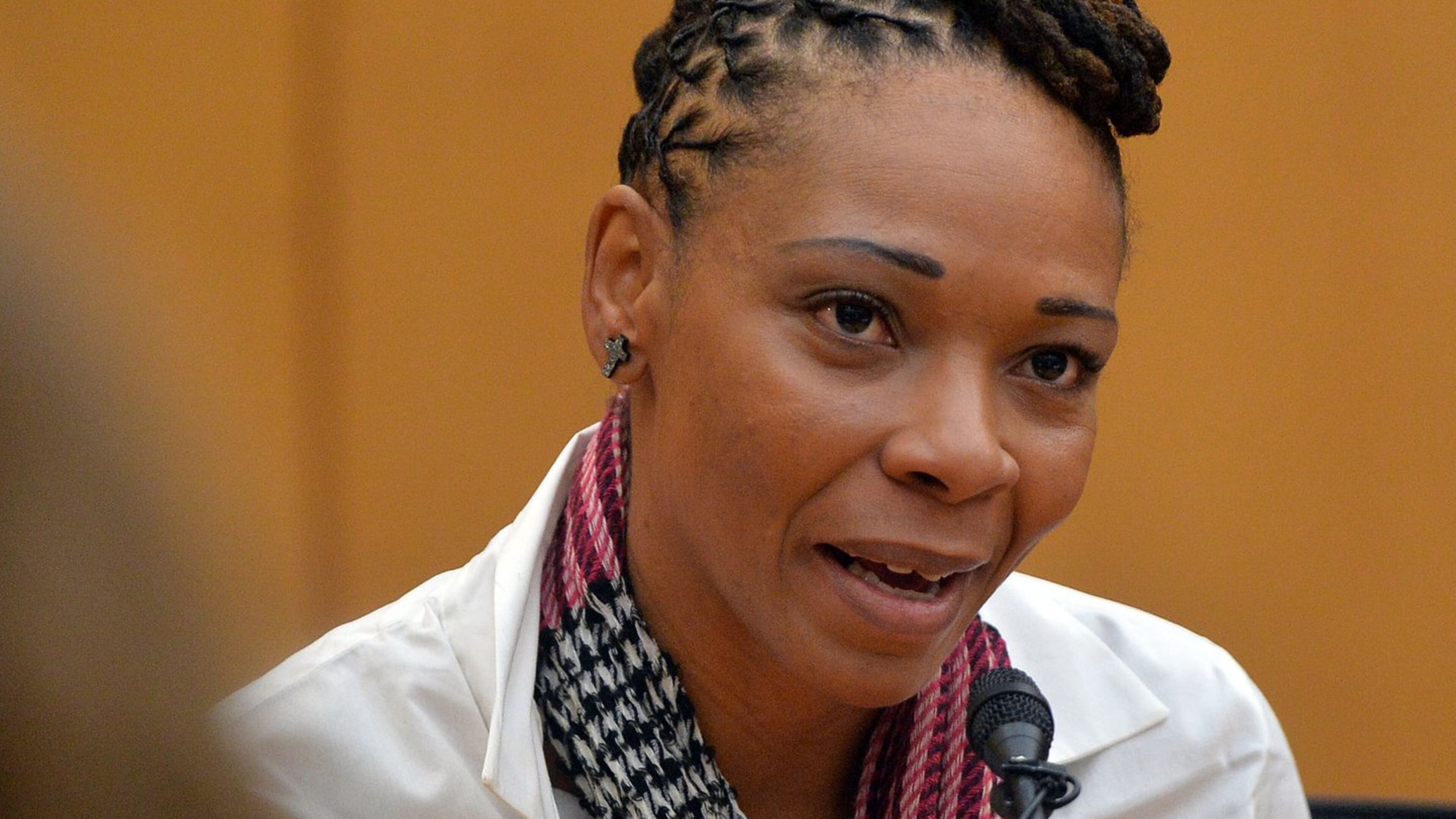 Tameka Butler-Grant, a former teacher at Dobbs Elementary and Parks Middle schools, testifies Wednesday in the Atlanta Public Schools test-cheating trial before Judge Jerry Baxter in Fulton County Superior Court. (Kent D. Johnson, The Atlanta Journal-Constitution)