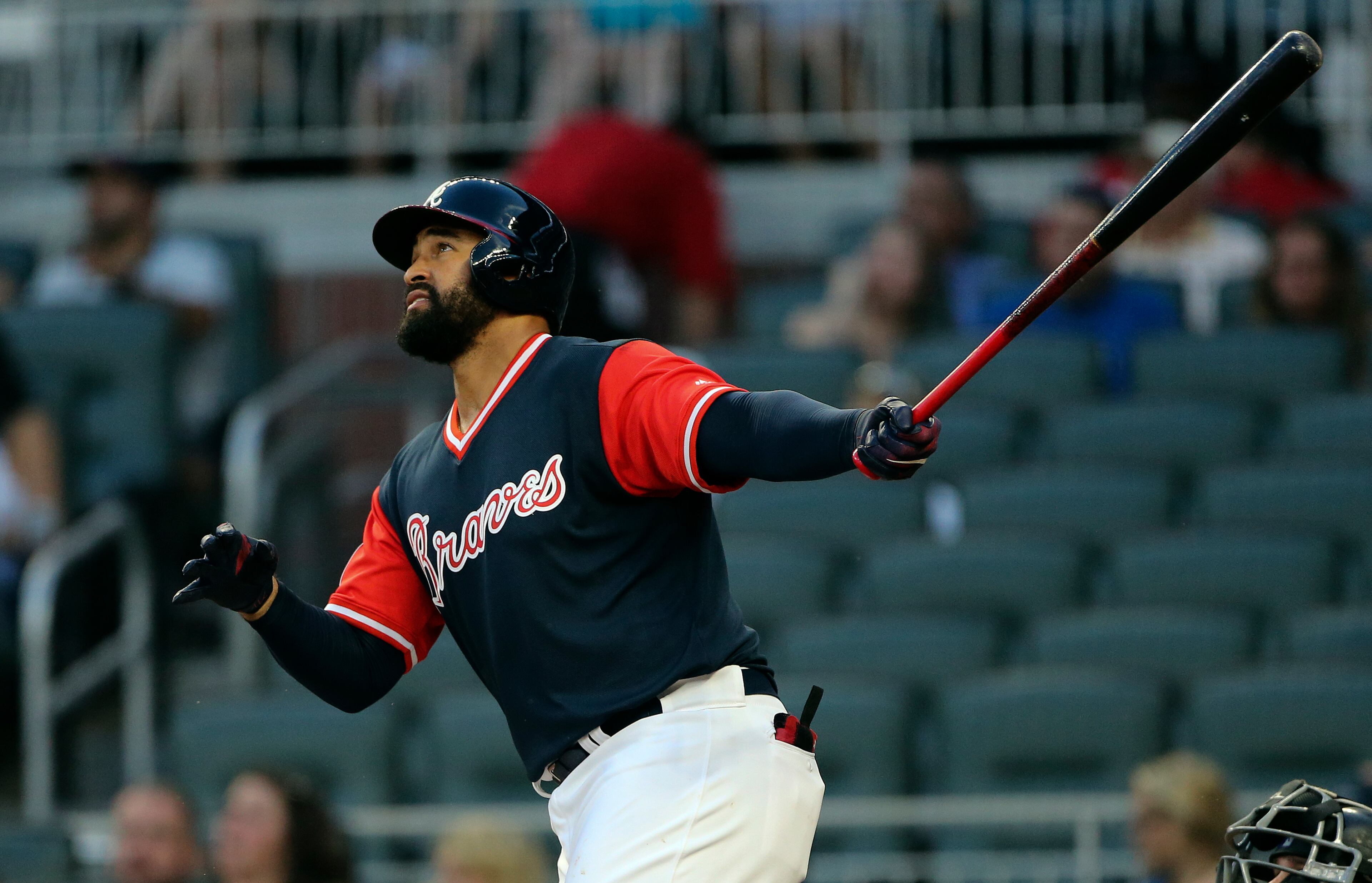 Atlanta Braves' Matt Kemp watches the flight of a two-run home run during the first inning of a baseball game against the Colorado Rockies on Friday, Aug. 25, 2017, in Atlanta. (AP Photo/John Bazemore)