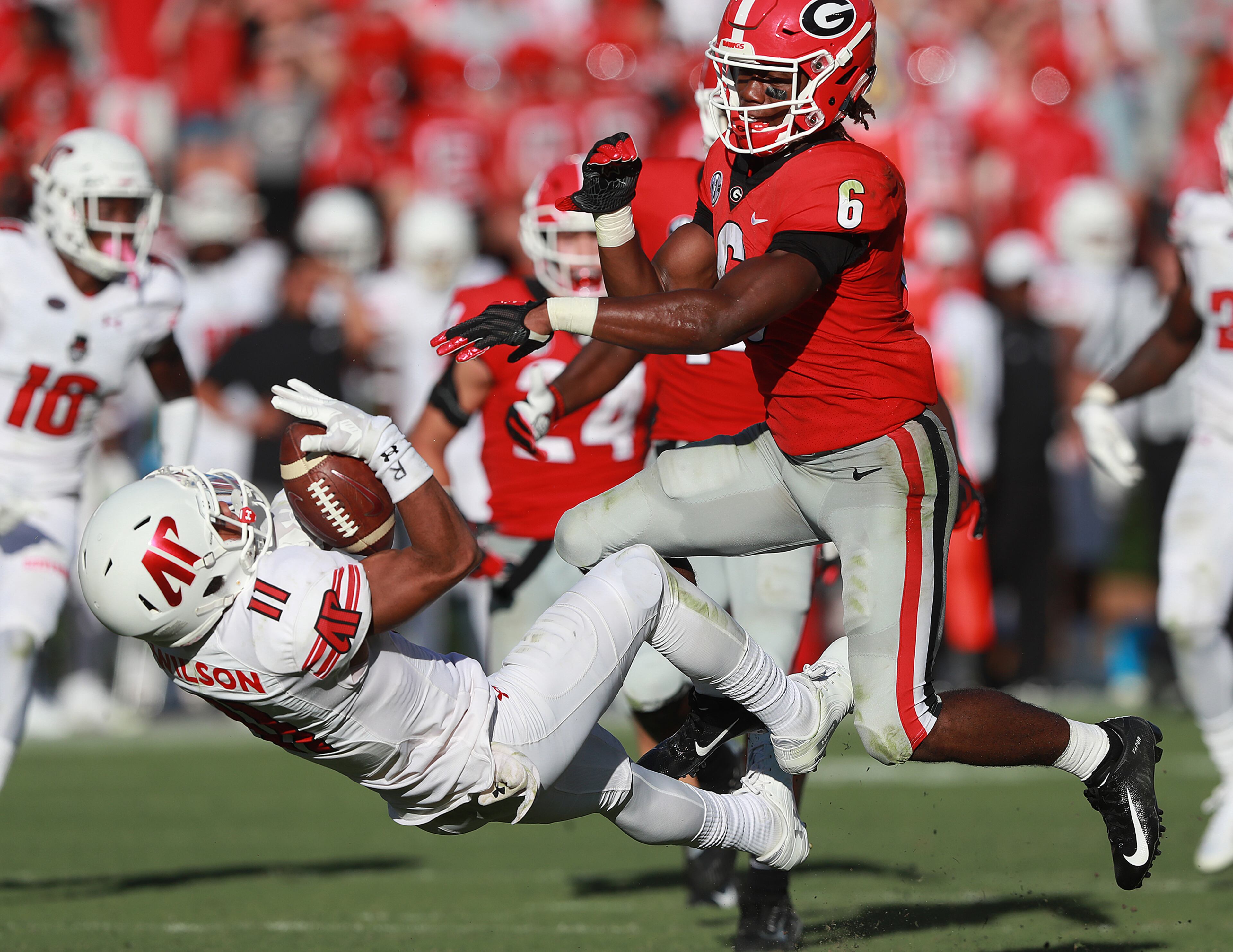 September 1, 2018 Athens: Georgia Bulldogs James Cook levels Austin Peayâs Deangelo Wilson on a kick return and is called for targeting and ejected from the game during the second half in a NCAA college football game on Saturday, Sept 1, 2018, in Athens. Curtis Compton/ccompton@ajc.com