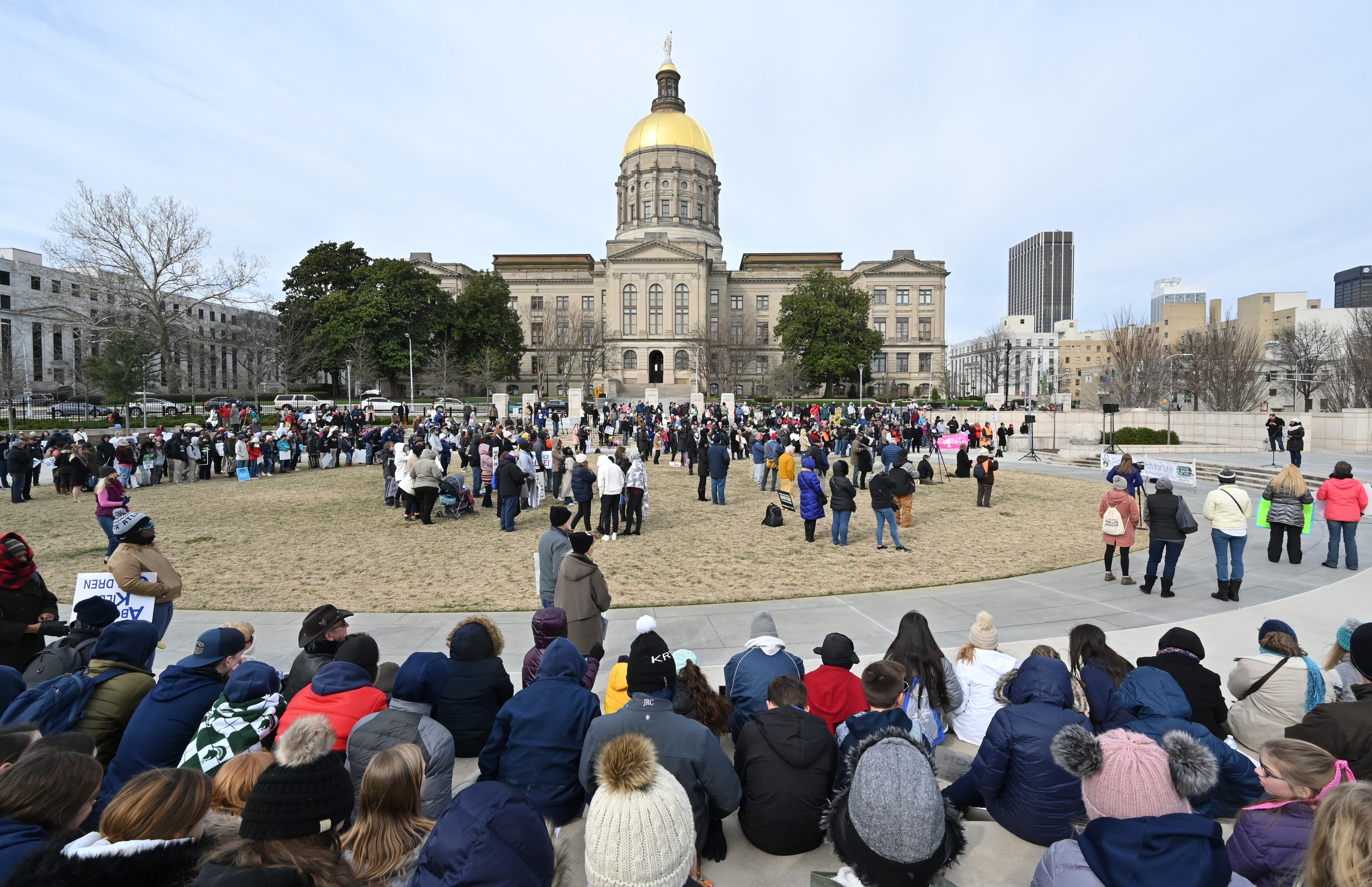January 22, 2020 Atlanta - Endia Bass (right) shares her story as Hundreds of pro-life supporters gathered during the 2020 Georgia March For Life & Memorial Service to raise awareness and support of anti-abortion legislation at Liberty Plaza on Wednesday, January 22, 2020. Anti-abortion advocates scored a win last year when Georgia passed a law that would ban the procedure once a doctor can detect fetal cardiac activity. But Georgia Right to Life had urged lawmakers to vote against it - and unendorsed several Republican candidates who voted in support of it - saying the bill did not go far enough because it allowed exceptions in instances of rape and incest. (Hyosub Shin / Hyosub.Shin@ajc.com)