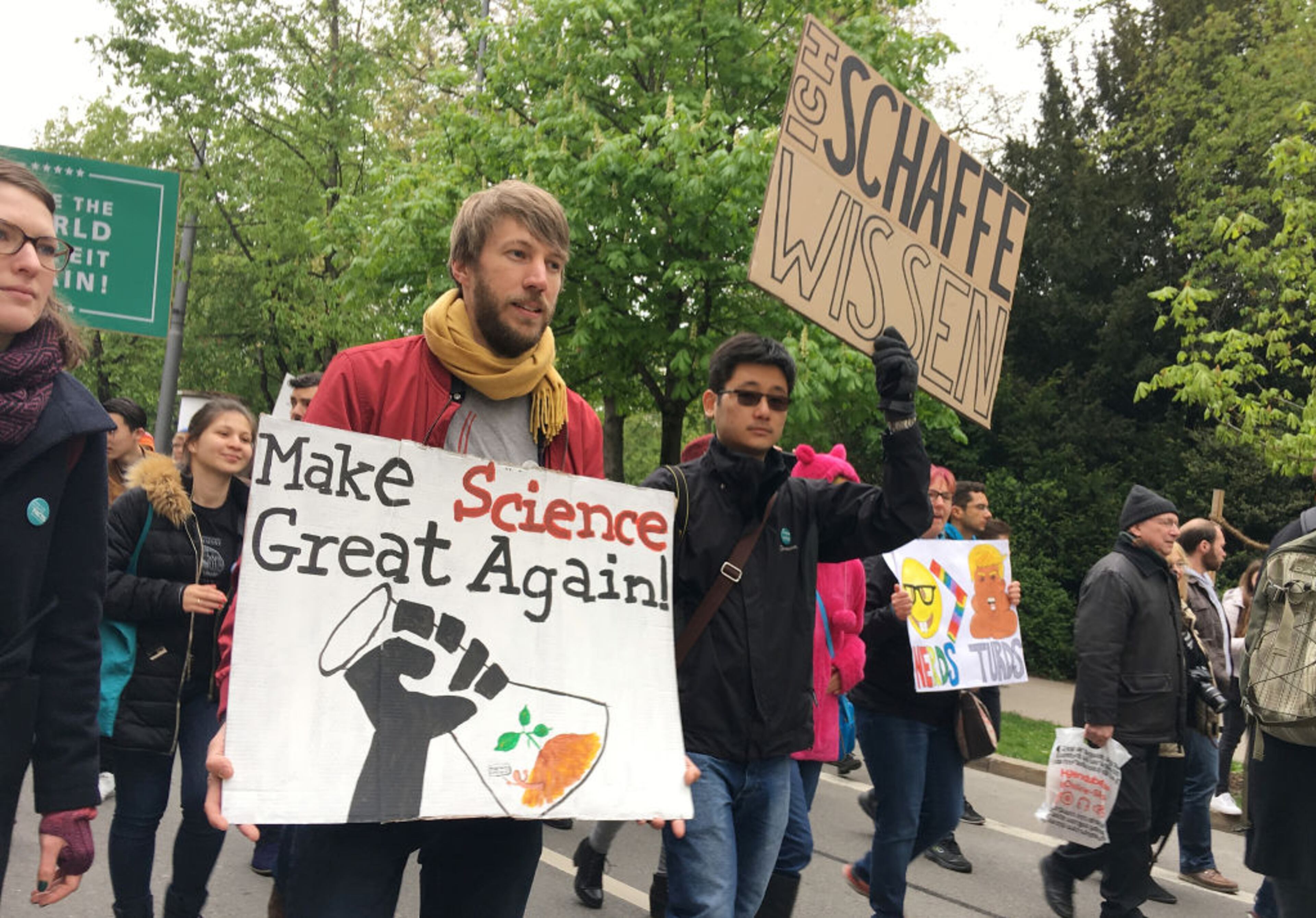 MUNICH, GERMANY - APRIL 22: People march in support of scientific research during the "March for Science" demonstration on April 22, 2017 in Munich, Germany. People all over the world are participating in "March for Science" demonstrations to protest against the statements and polices of the administration of U.S. President Donald Trump that deride scientific research deemed inconvenient for Trump's political agenda. (Photo by Sandra Montanez/Getty Images)
