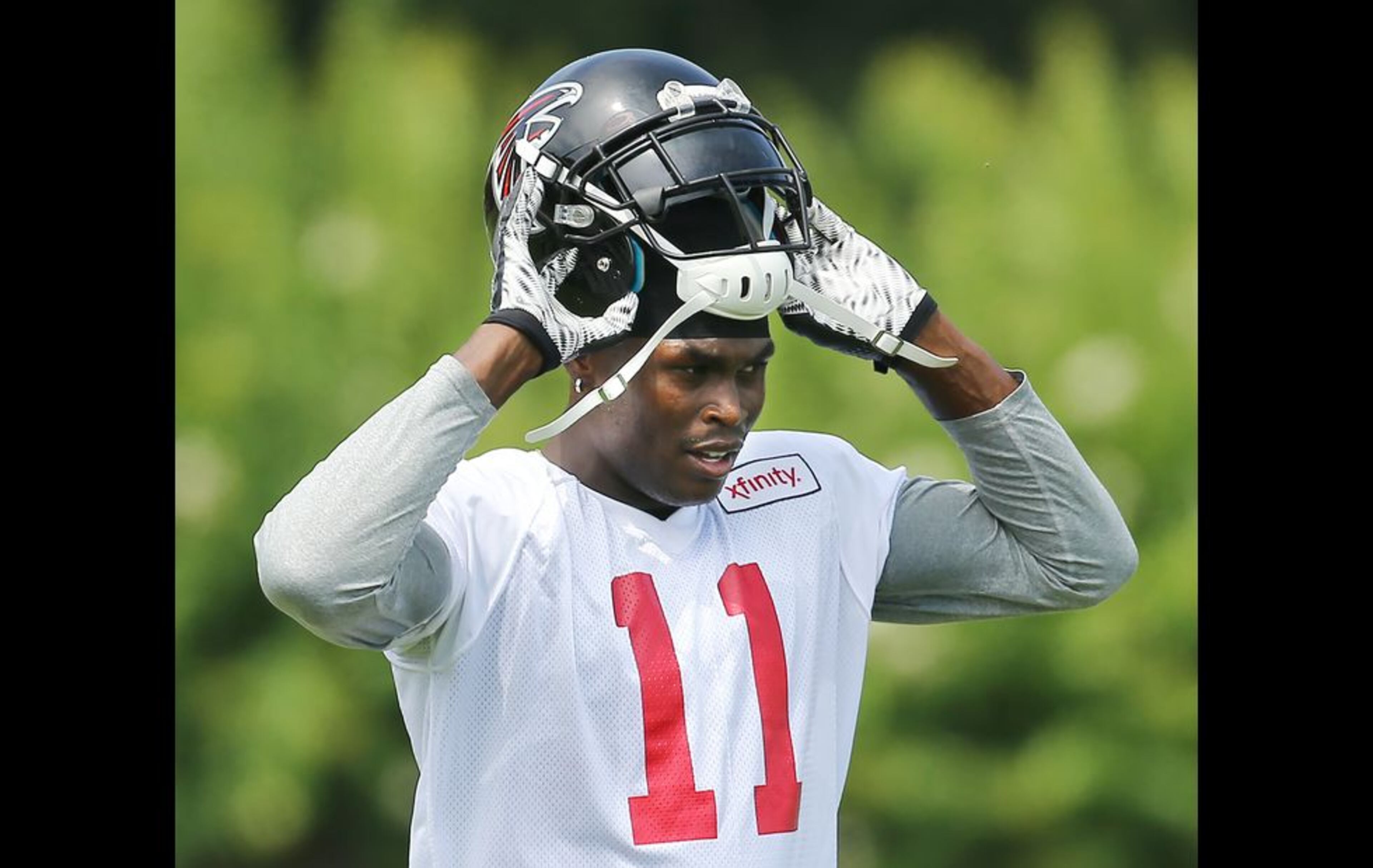 073115 FLOWERY BRANCH: Falcons wide receiver Julio Jones takes the field for the first day of training camp on Friday, July 31, 2015, in Flowery Branch. Curtis Compton / ccompton@ajc.com