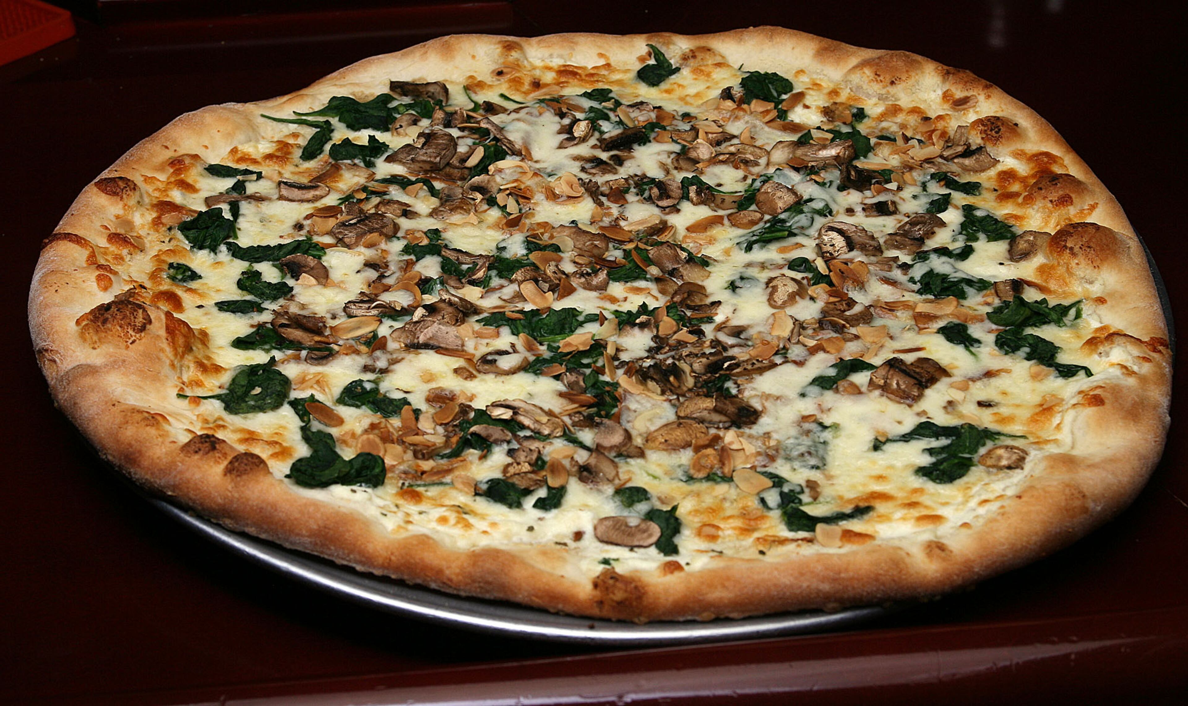 "The food made me think of the Italian diner my family always stopped in on the way to Jersey Shore. The acid clarity of that tomato sauce, the cardboardy flavor of breadcrumbs, the fennel zing of sausage, the thin blankets of melted cheese over everything."