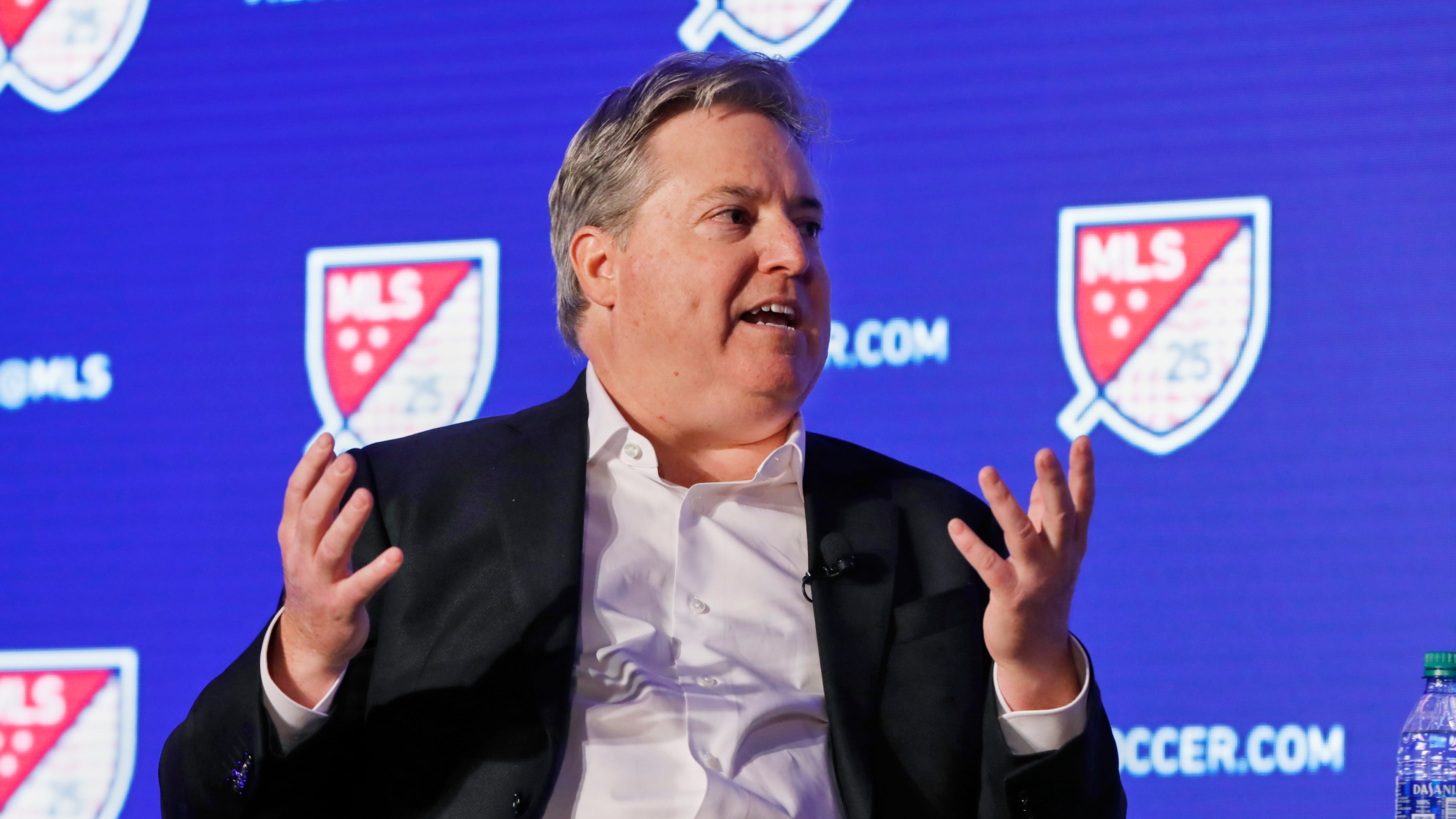FILE - Los Angeles FC lead owner Larry Berg gestures during an interviewed at the Major League Soccer 25th Season kickoff event in New York, Feb. 26, 2020. (AP Photo/Richard Drew, File)